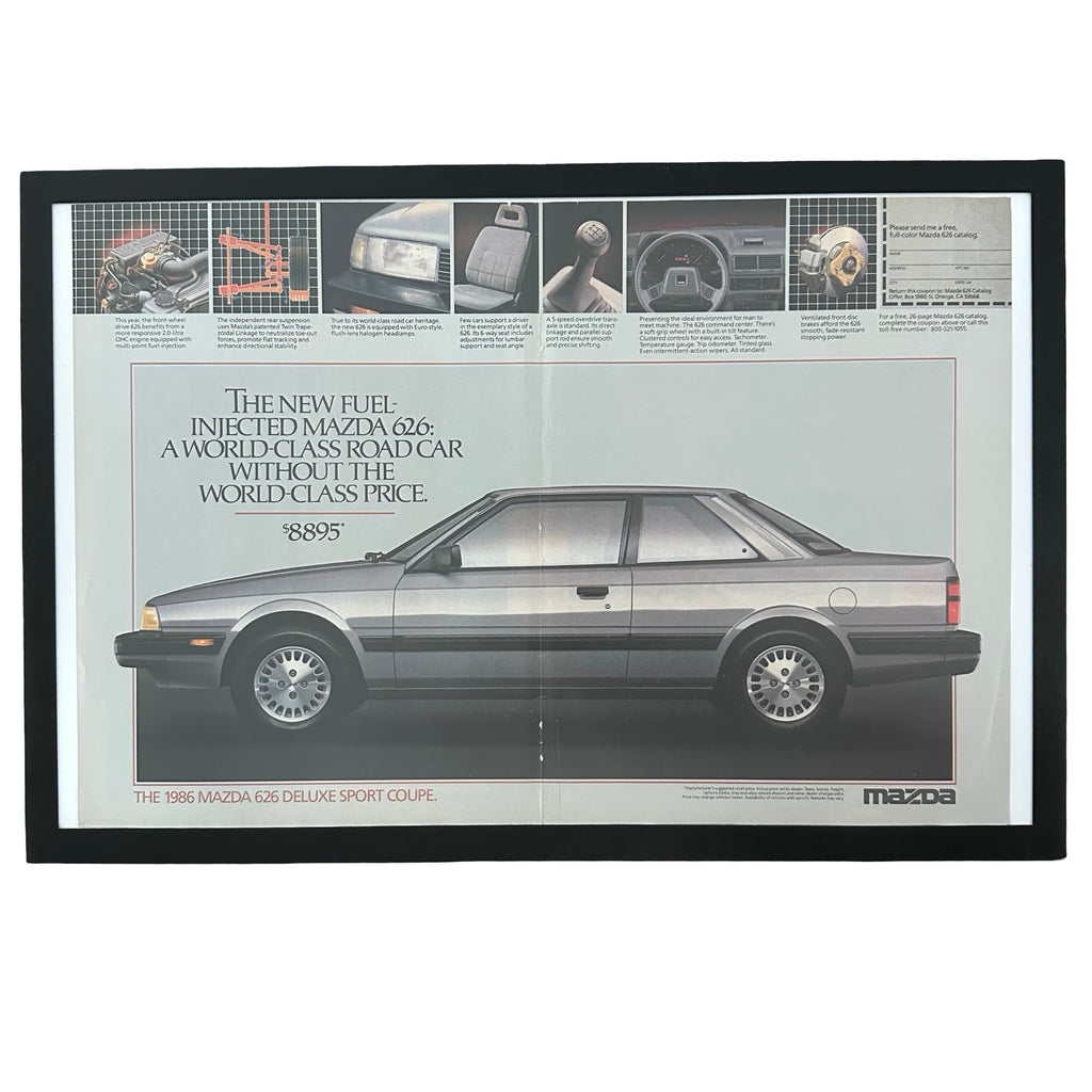 Framed vintage 1986 Mazda 626 Sport Coupe double page magazine ad on white background