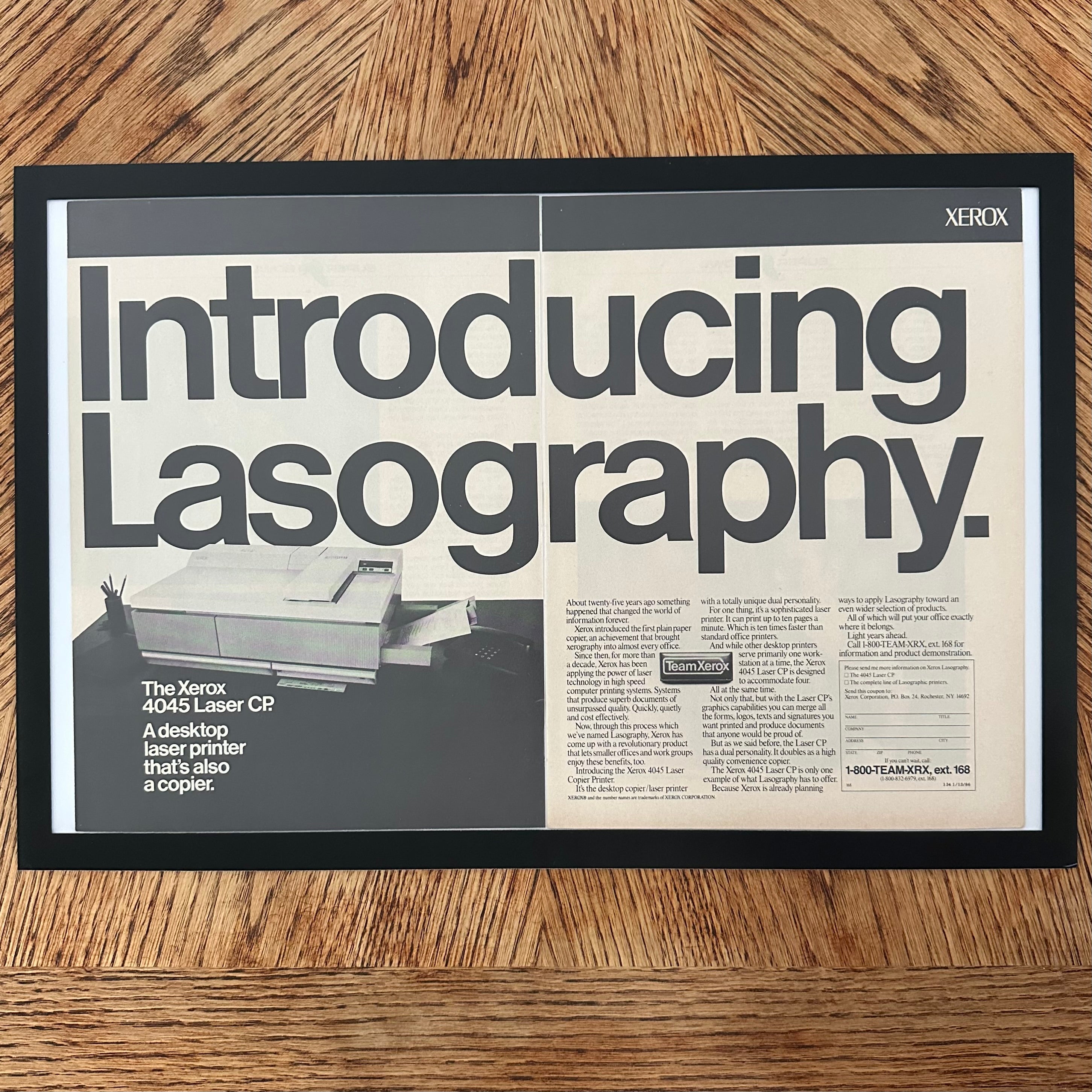 Framed vintage Xerox Lasography laser printer double page magazine ad