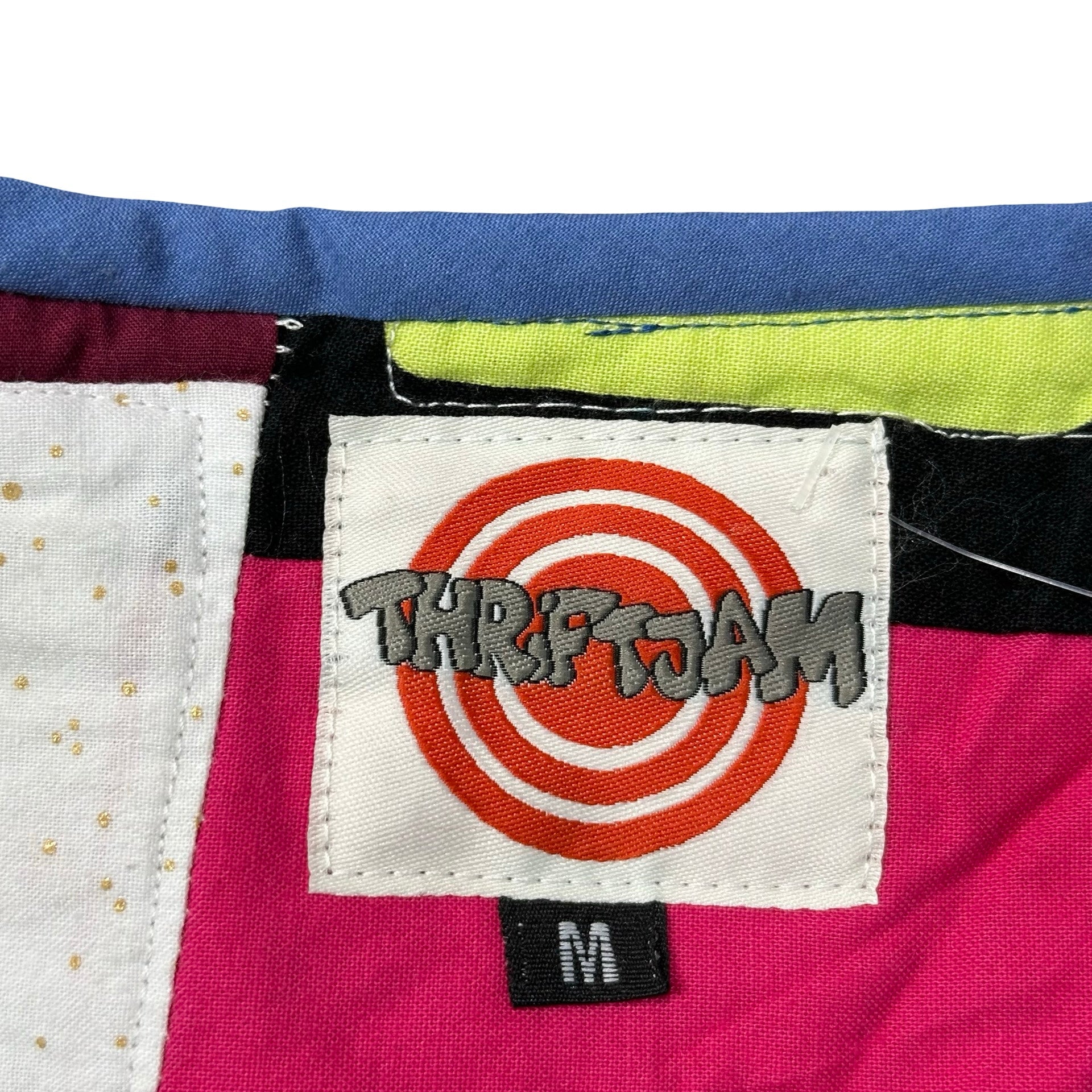 Copper and Cobalt Crazy Quilt M vest rework - ThriftJam size tag