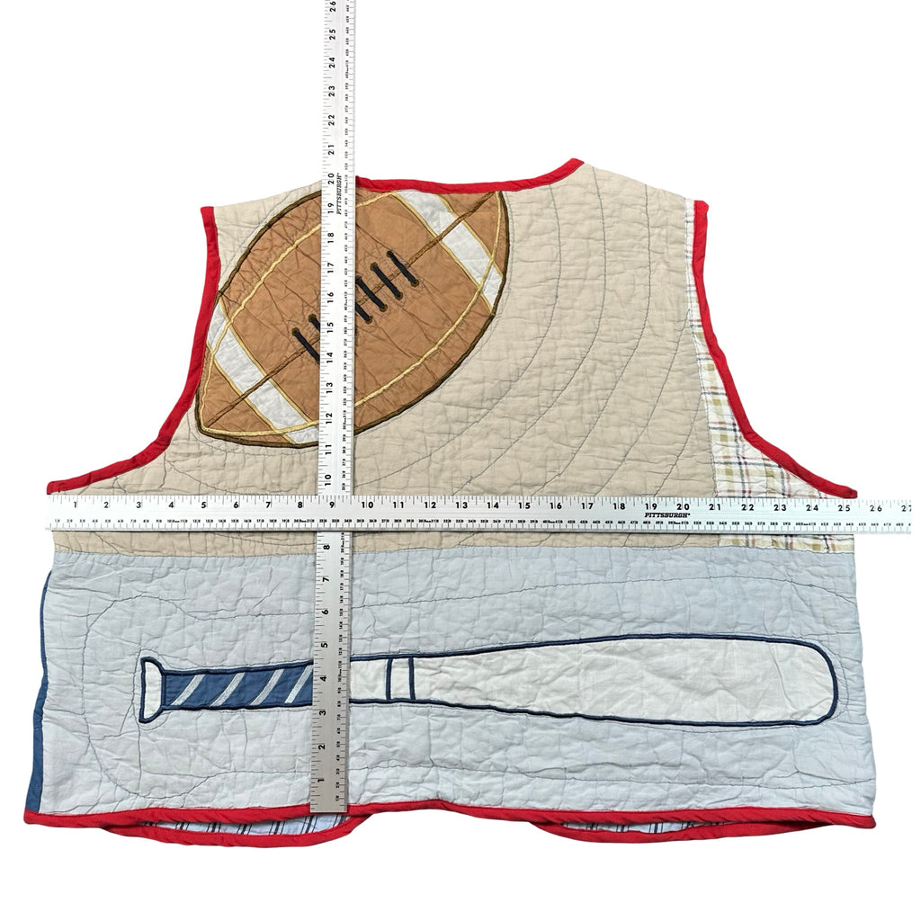 Sandlot Sports quilted vest rework, flat lay measurements with tape measure