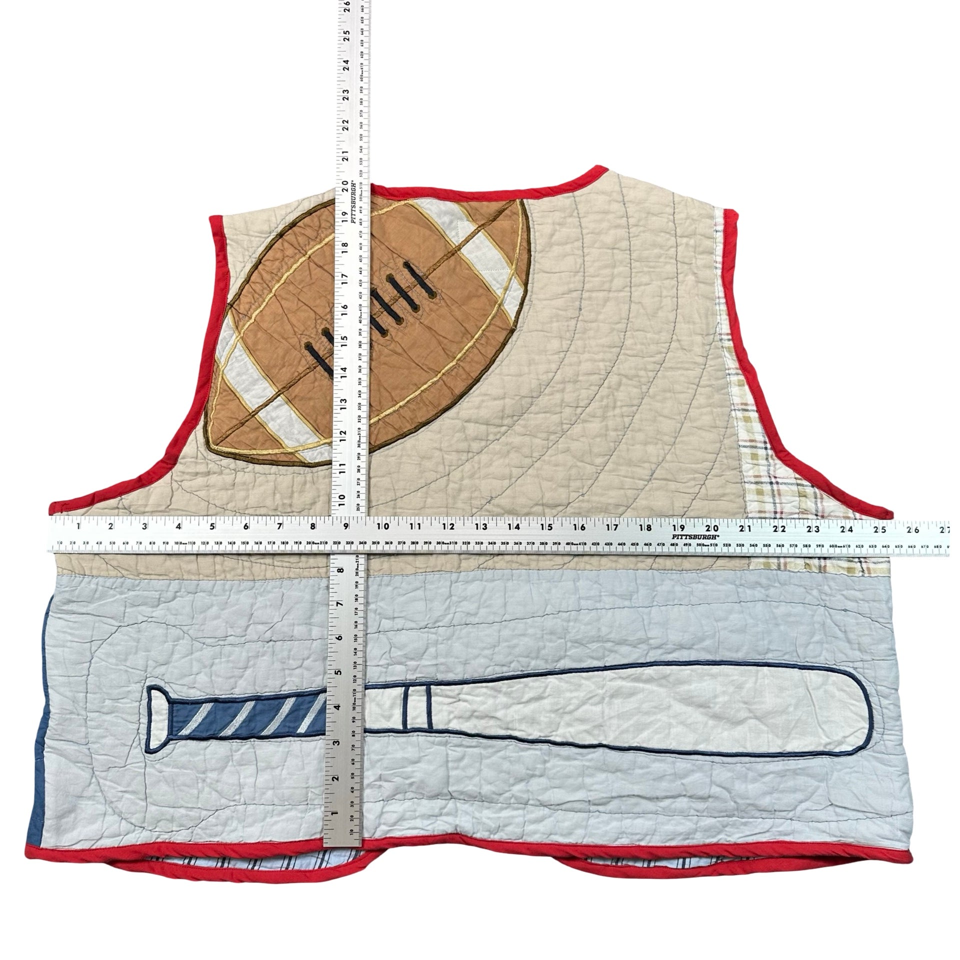 Sandlot Sports quilted vest rework, flat lay measurements with tape measure