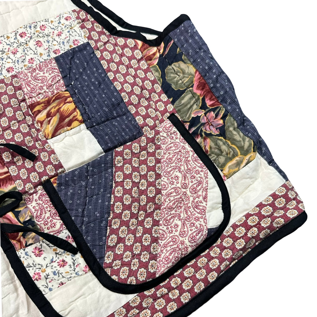 Claret Courthouse Steps quilted vest rework, front pocket and calico piecing detail