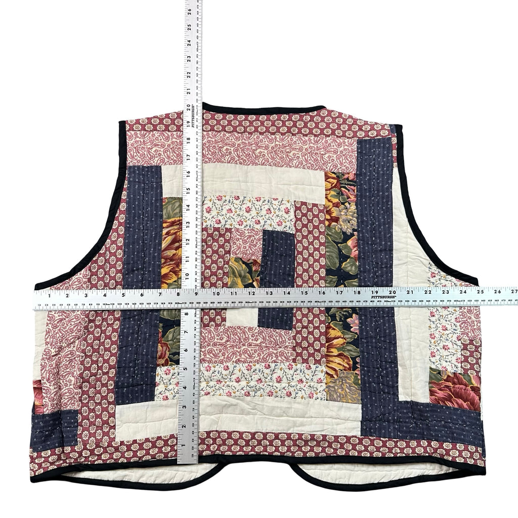Claret Courthouse Steps quilted vest rework, flat lay measurements with tape measure