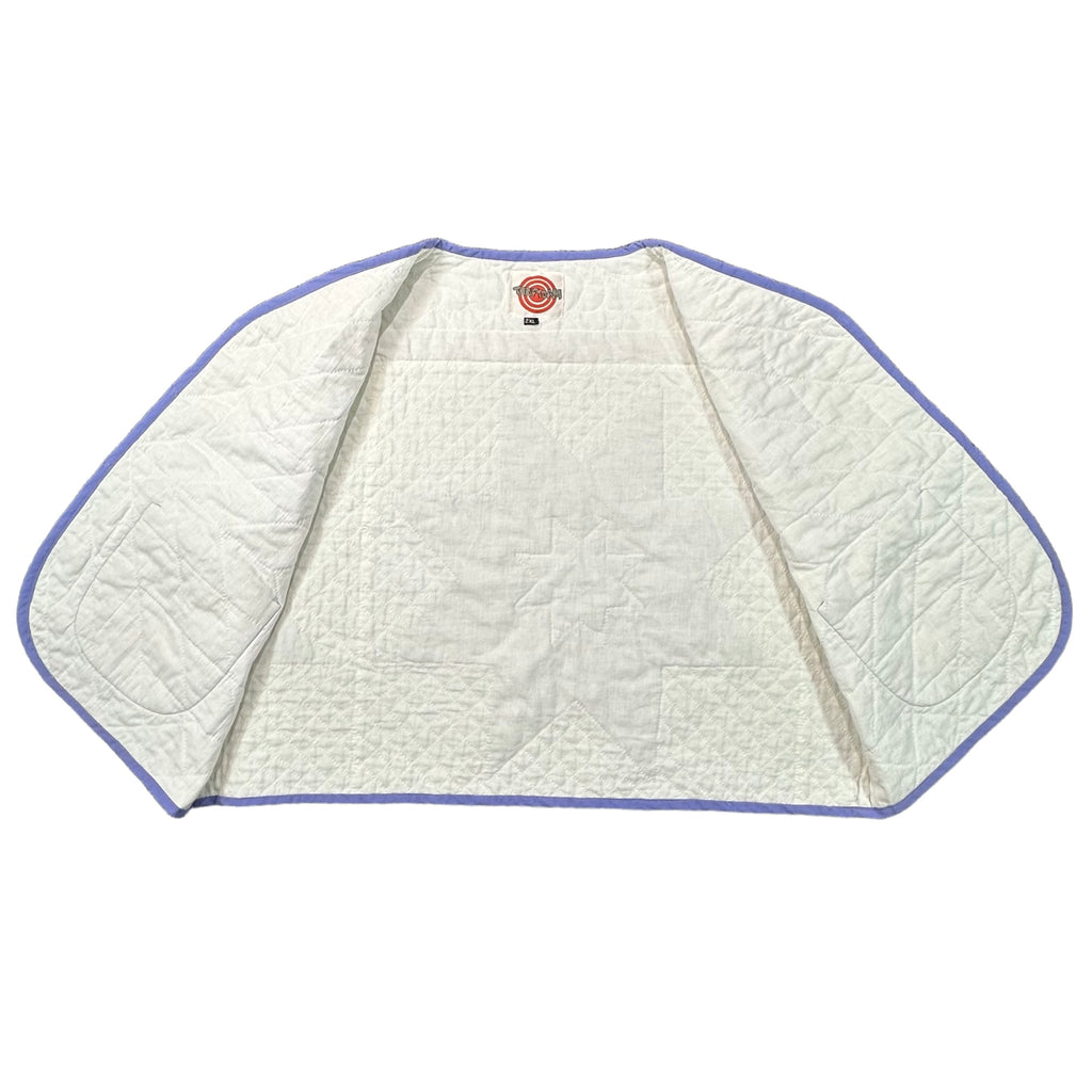 Periwinkle Cross Stitch Star quilted vest rework, interior cream lining