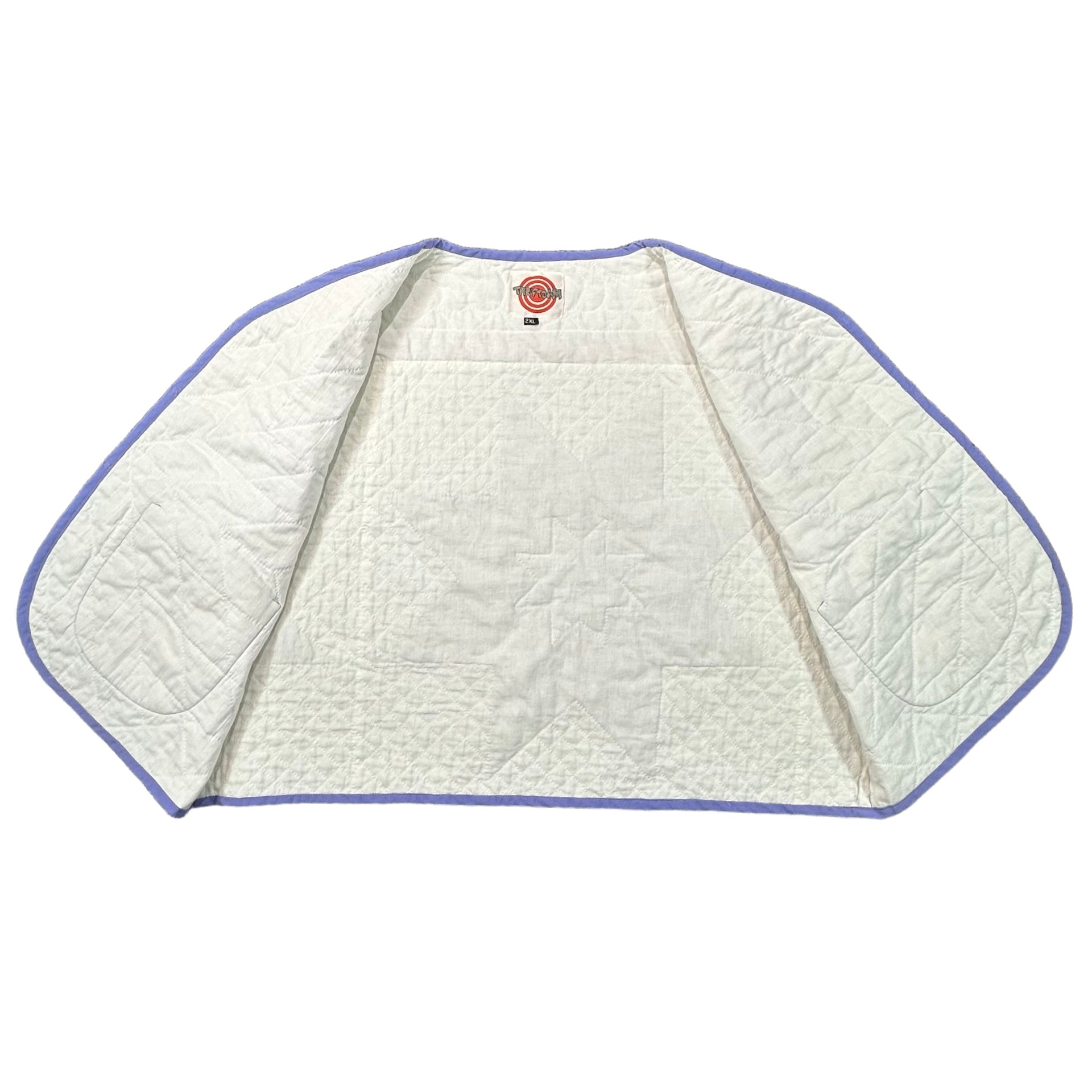 Periwinkle Cross Stitch Star quilted vest rework, interior cream lining