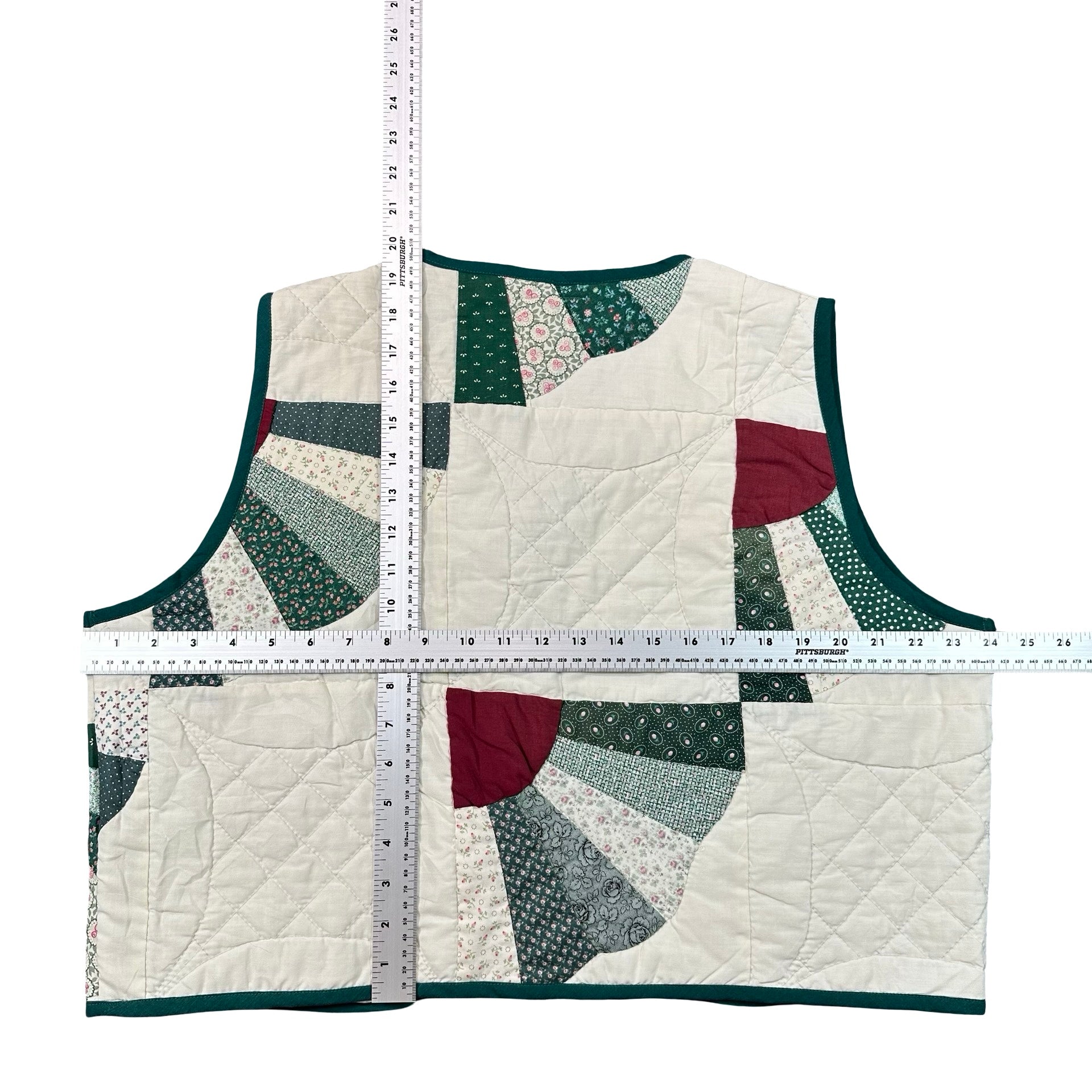 Forest Fan Patchwork XL quilted vest rework, tape measure across the chest