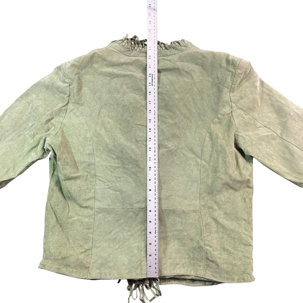 Sage green suede jacket with measuring tape for length