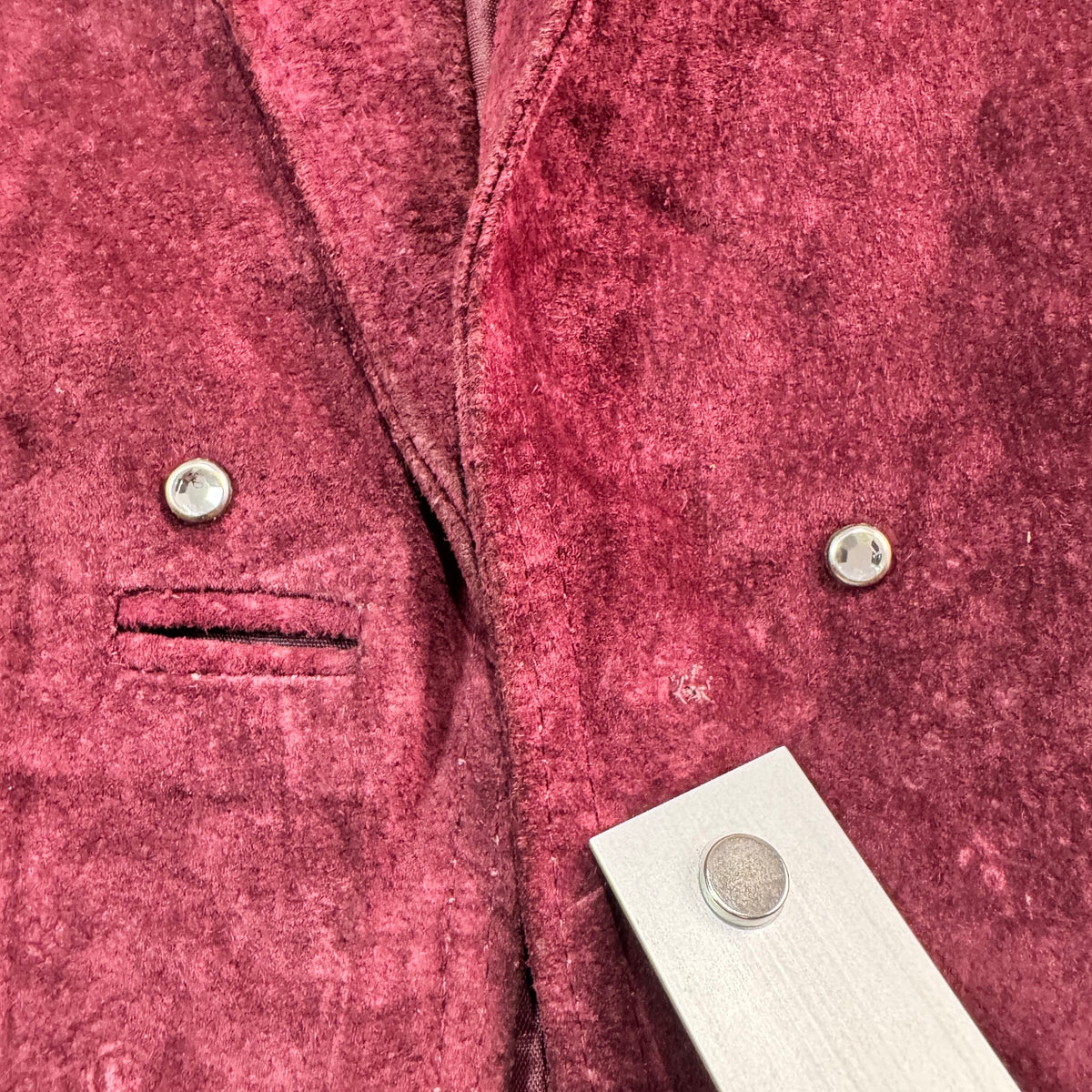 Close-up of minor wear on front