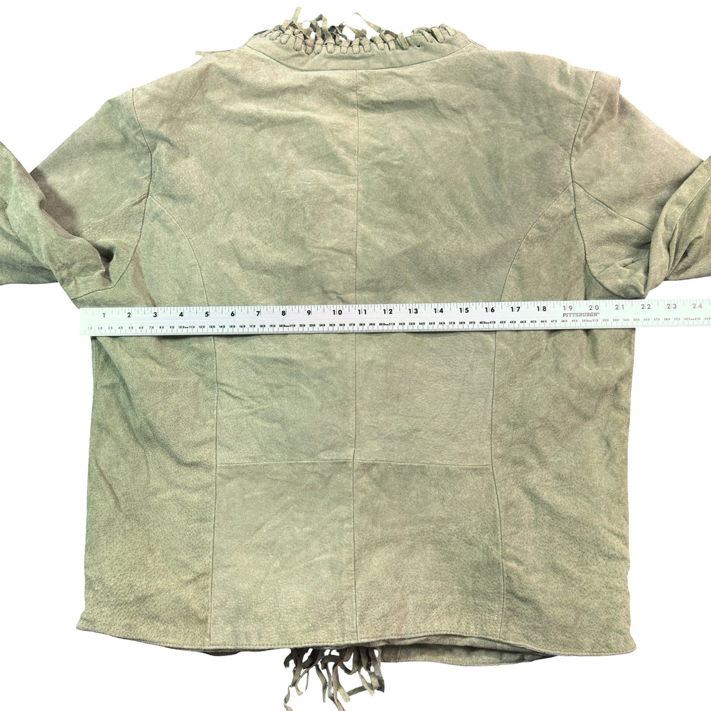 Sage green suede jacket with measuring tape across the chest
