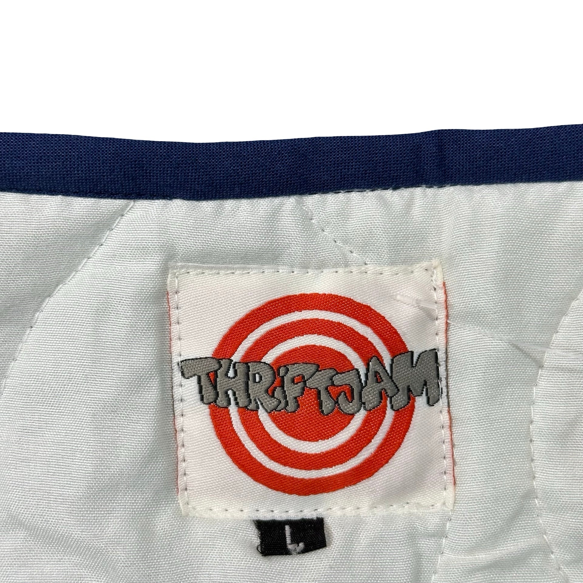 Delft Triangle Patchwork L quilted vest rework - ThriftJam size tag