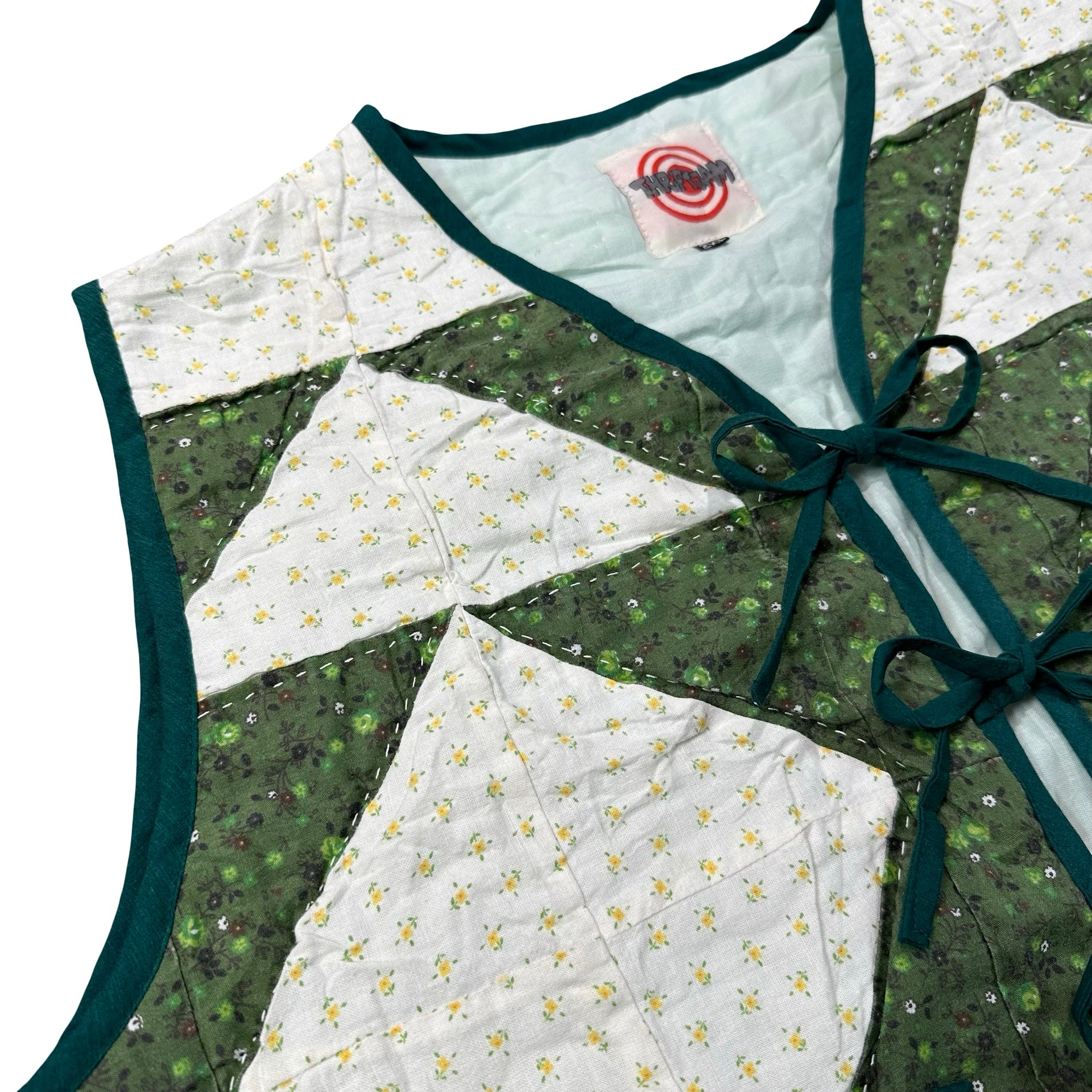 Clover Churn Dash quilted vest rework, front tie closures detail