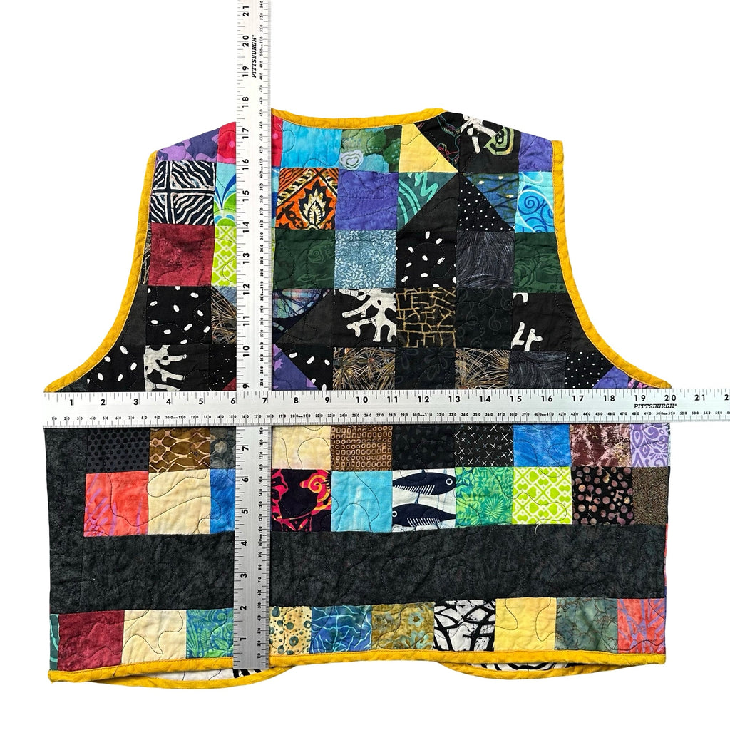 Midnight Batik Scrap S quilted vest rework - tape measure