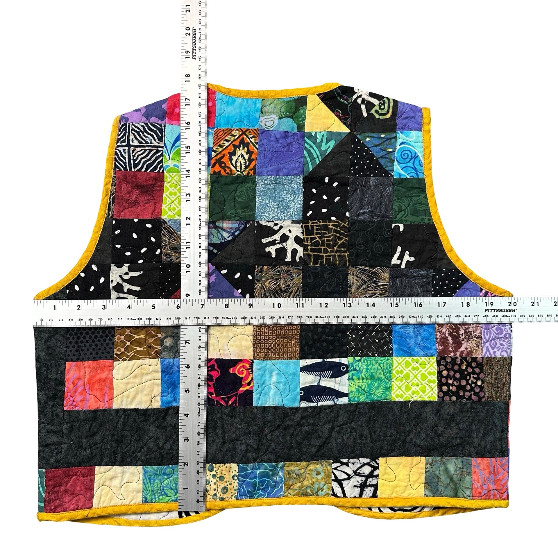 Midnight Batik Scrap S quilted vest rework - tape measure