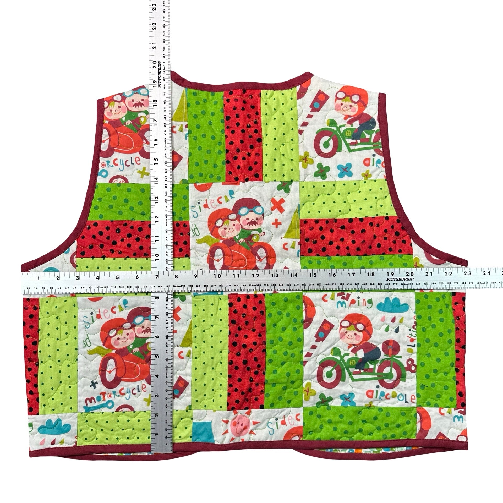 Tricycle Playroom L quilted vest rework - tape measure