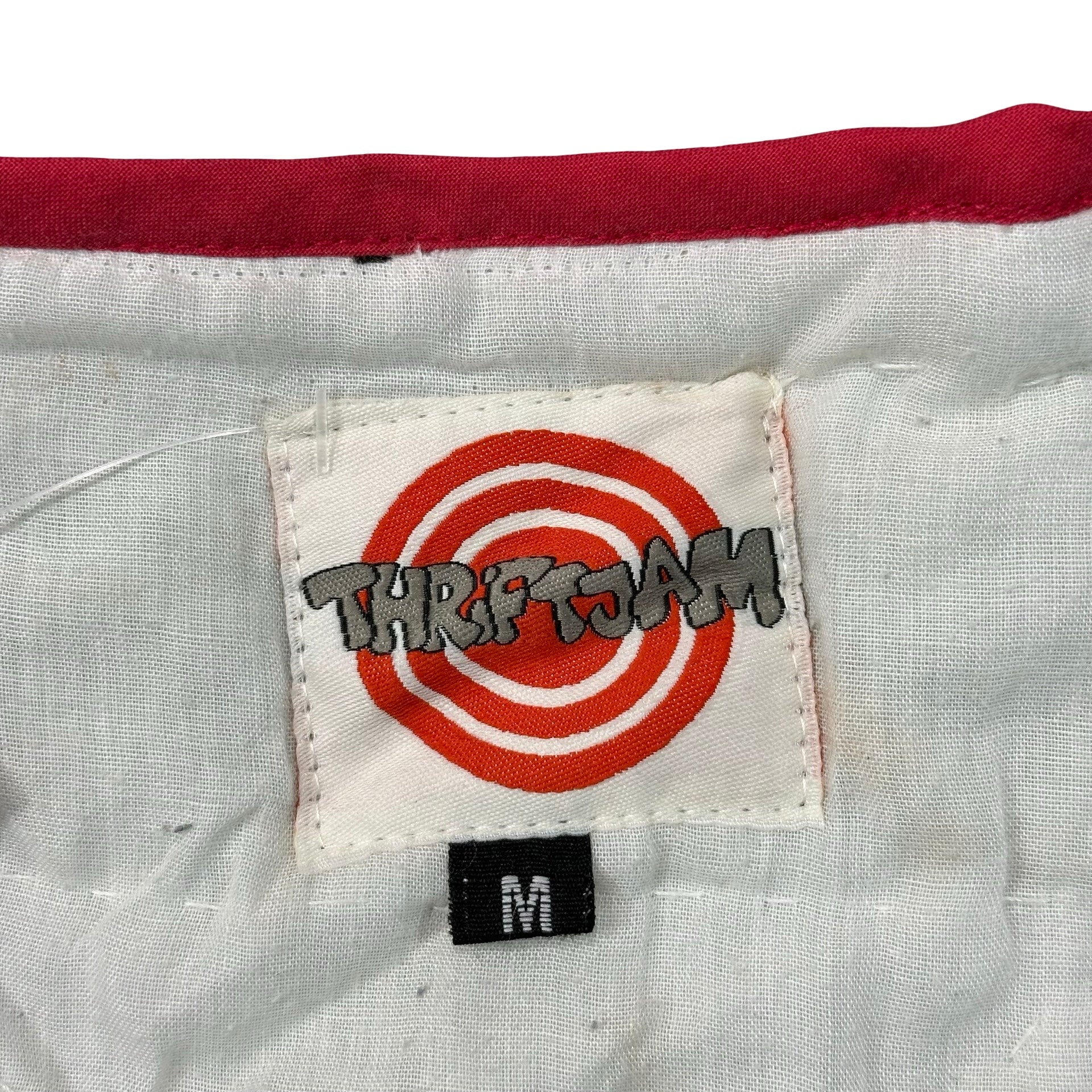 Poinsettia Star M quilted vest rework - ThriftJam size tag