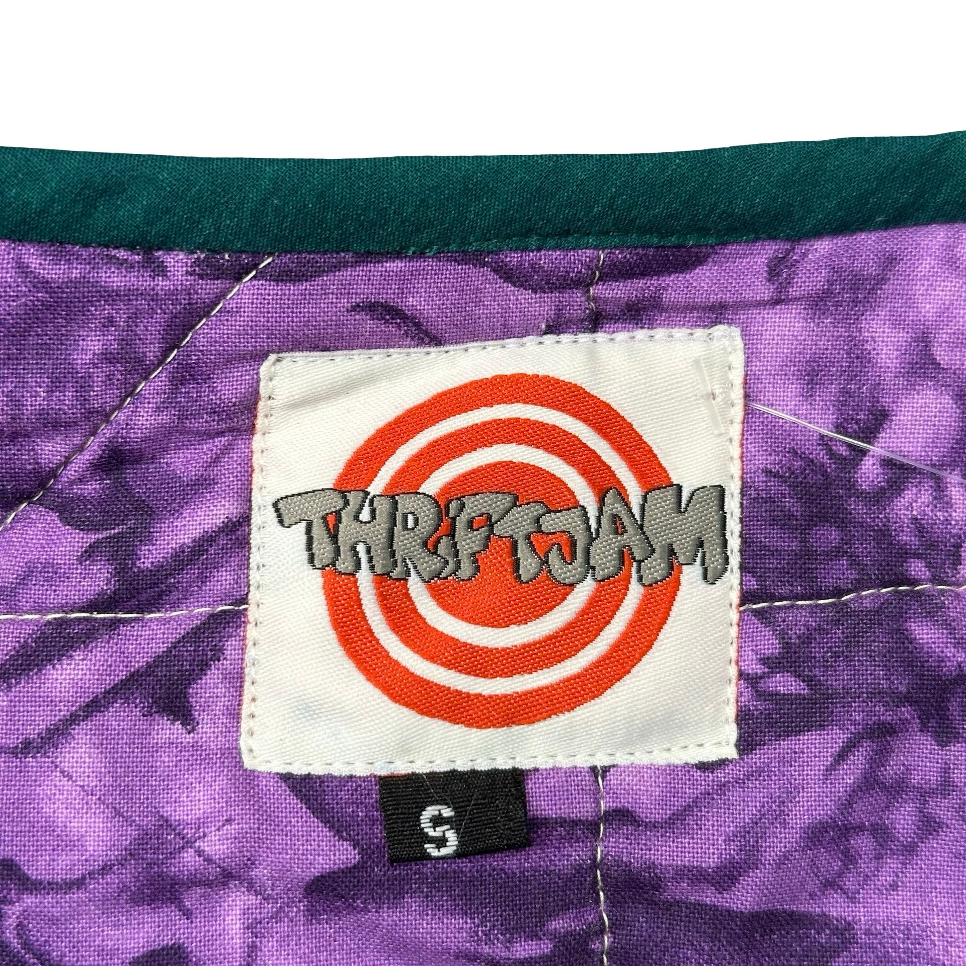 Amethyst Pinwheel S quilted vest rework - ThriftJam size tag