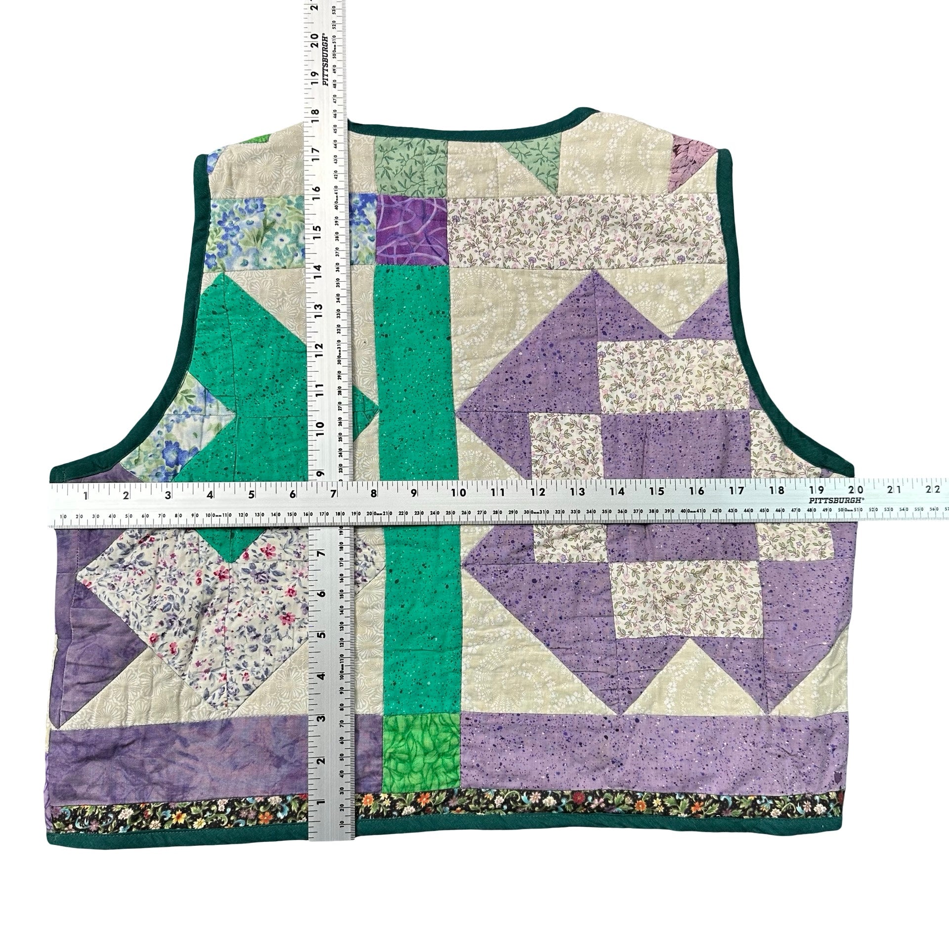 Amethyst Pinwheel S quilted vest rework - tape measure