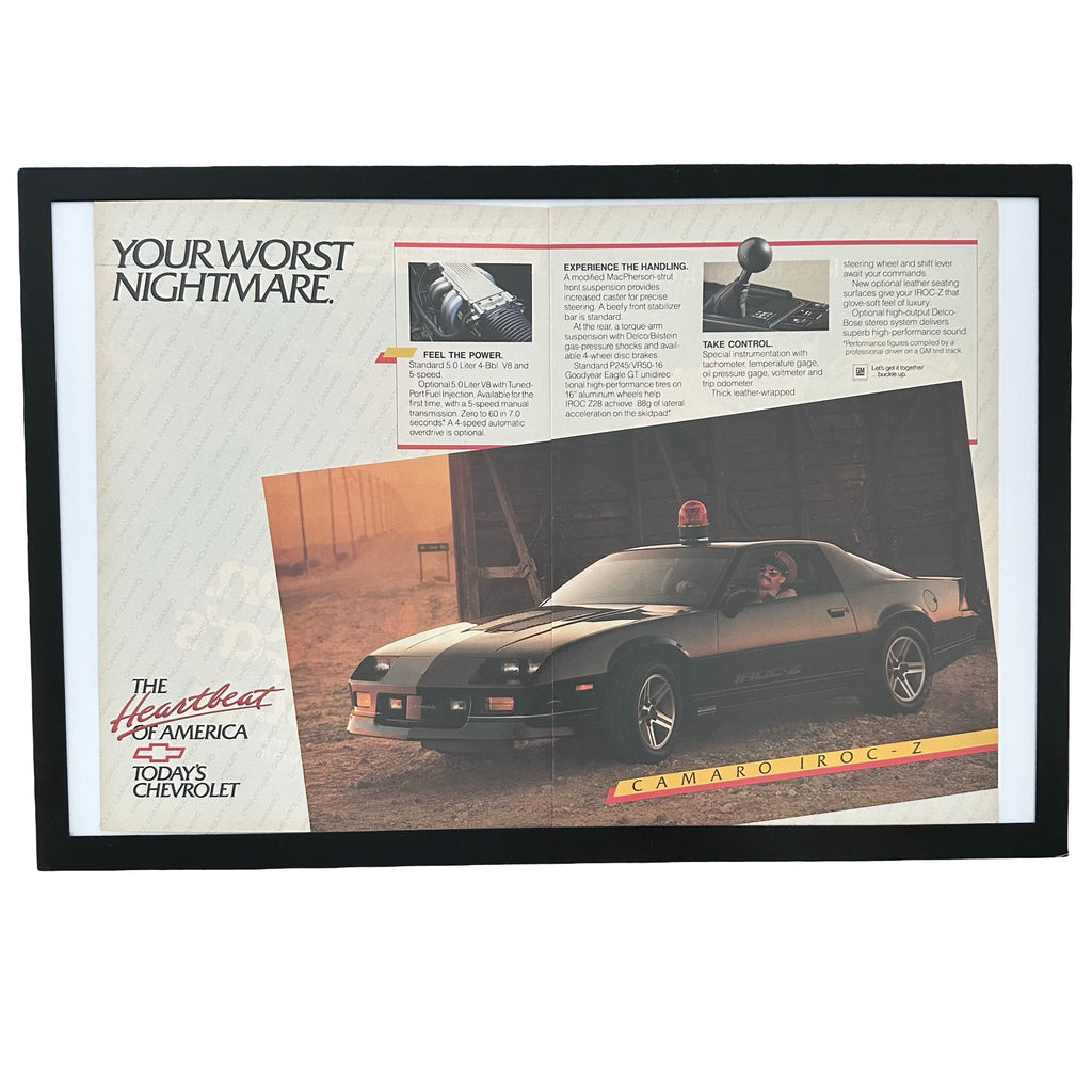 Framed vintage Chevrolet Camaro IROC-Z double page magazine ad on white background