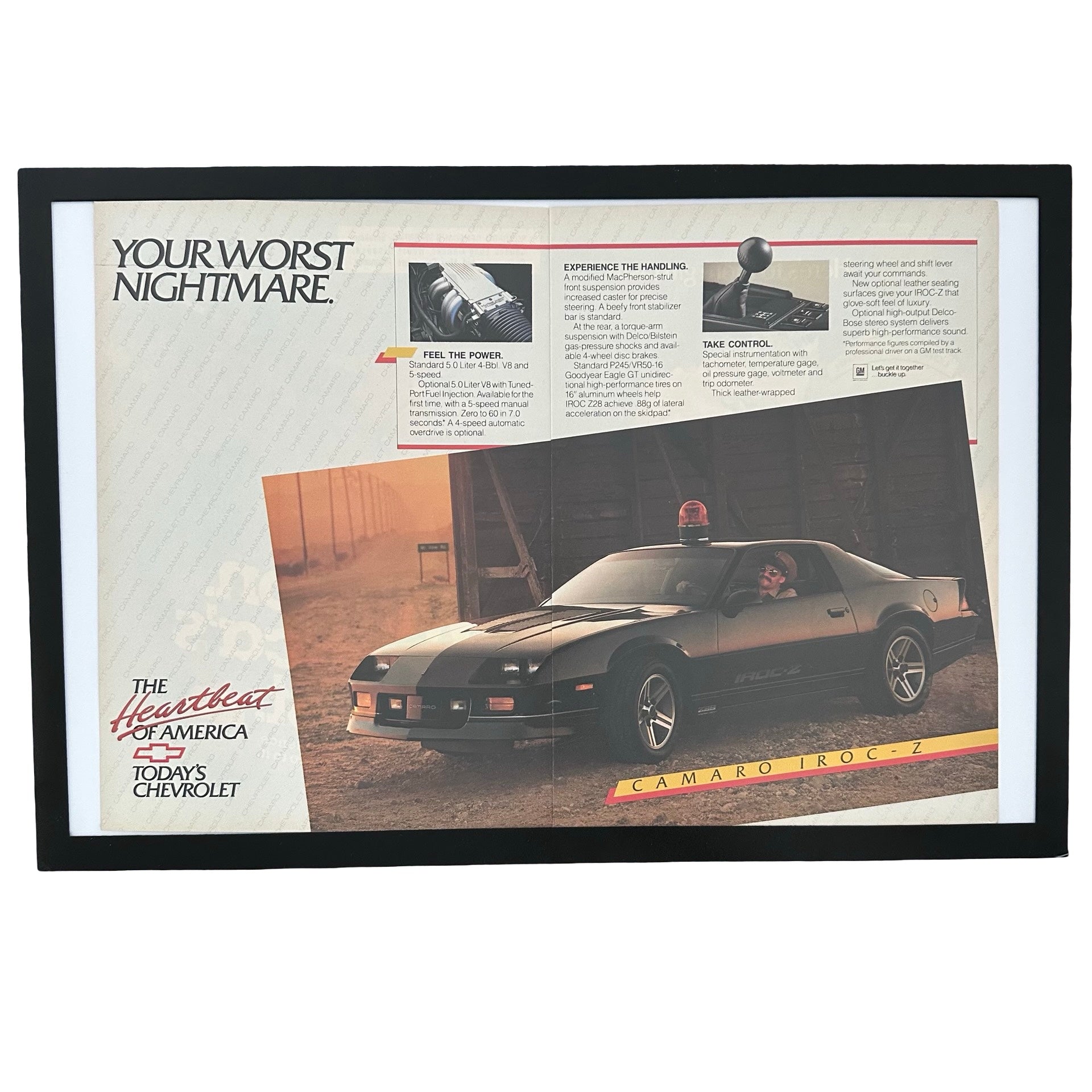Framed vintage Chevrolet Camaro IROC-Z double page magazine ad on white background