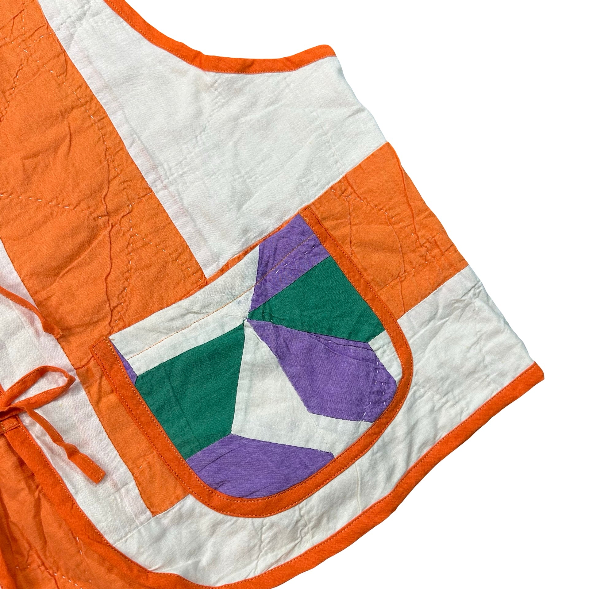 Marigold Card Trick quilted vest rework, front pocket and card trick piecing detail