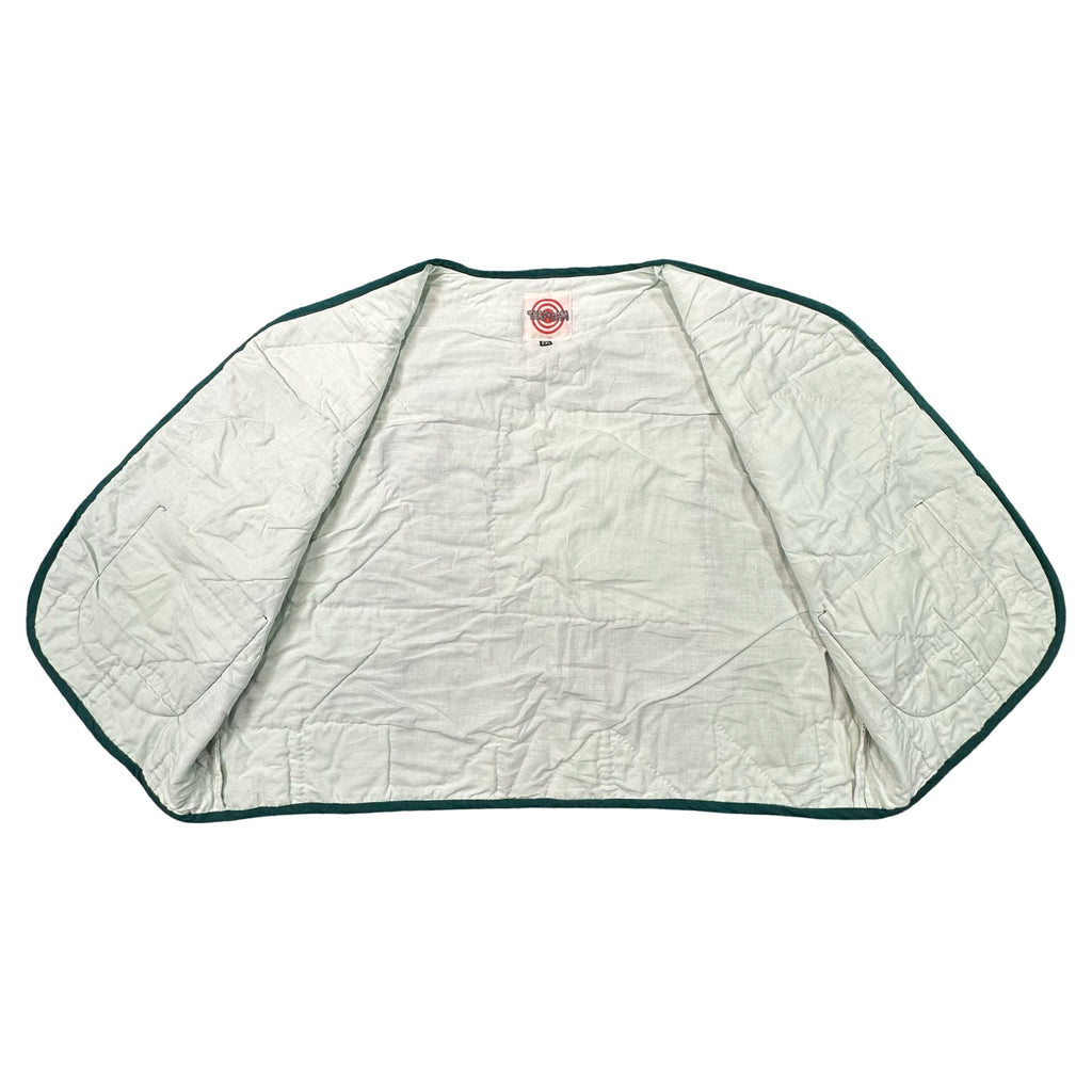 Clover Churn Dash quilted vest rework, interior cream lining