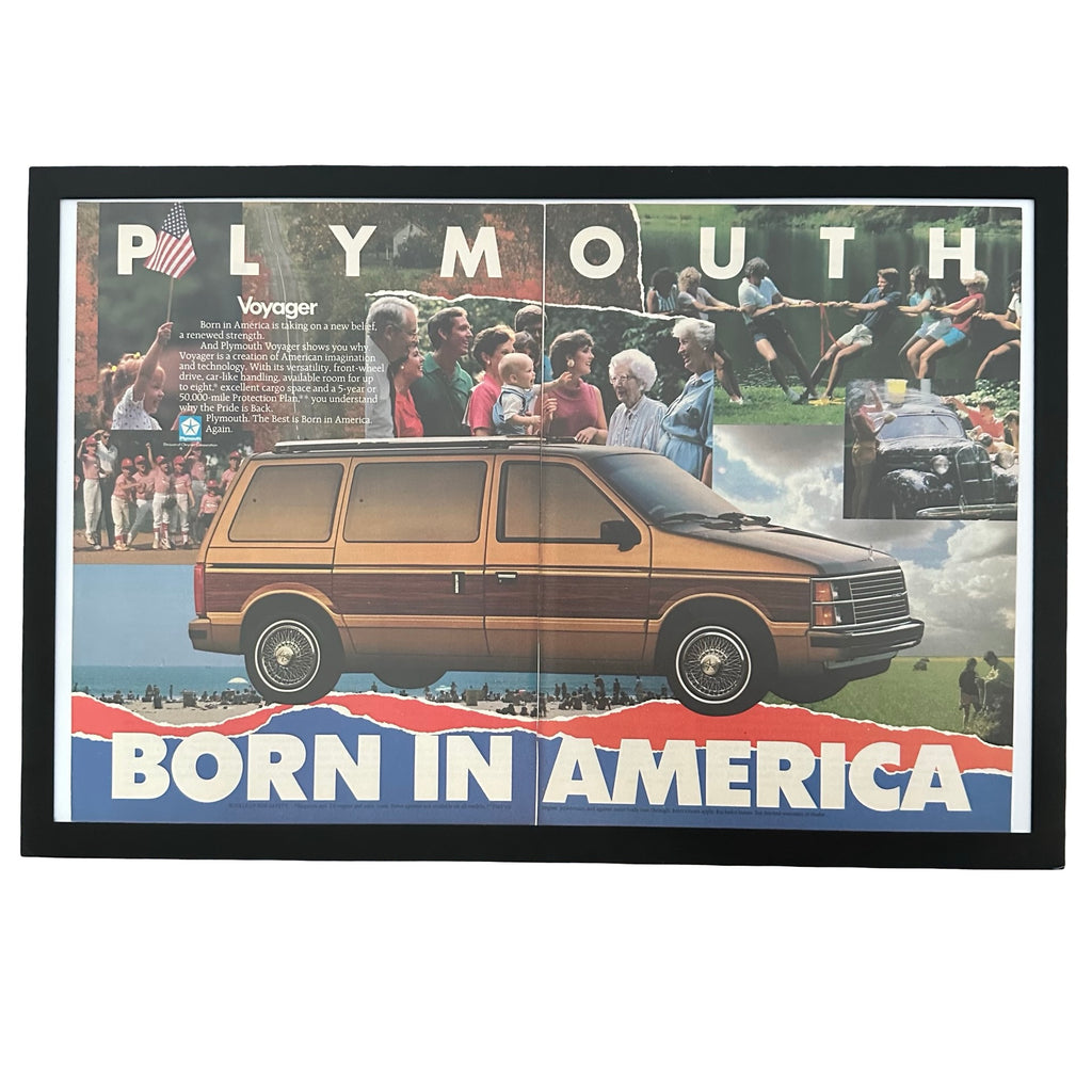 Framed vintage Plymouth Voyager Born in America double page magazine ad on white background
