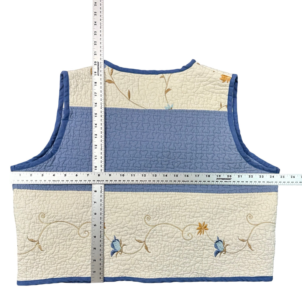 Bluebell Vine Embroidery quilted vest rework, flat lay measurements with tape measure