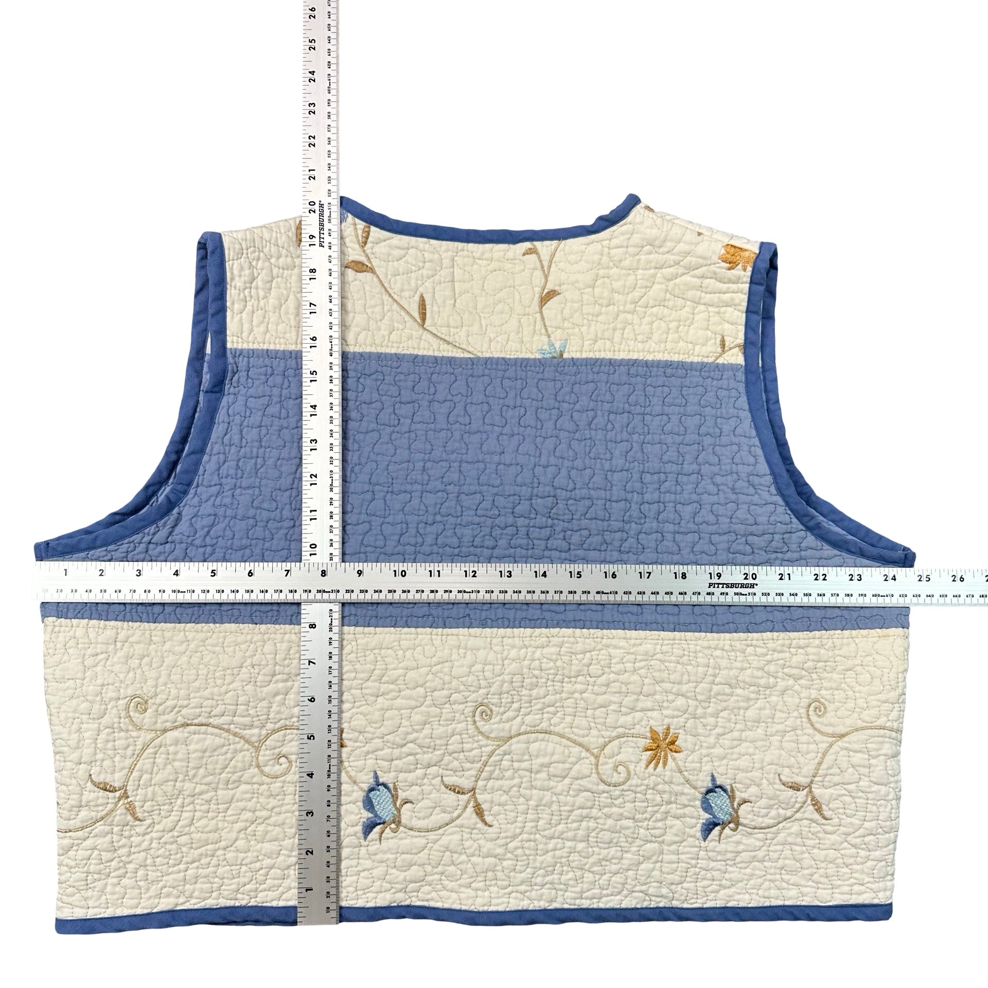 Bluebell Vine Embroidery quilted vest rework, flat lay measurements with tape measure