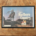 Framed vintage Marlboro Country cowboy double page magazine ad