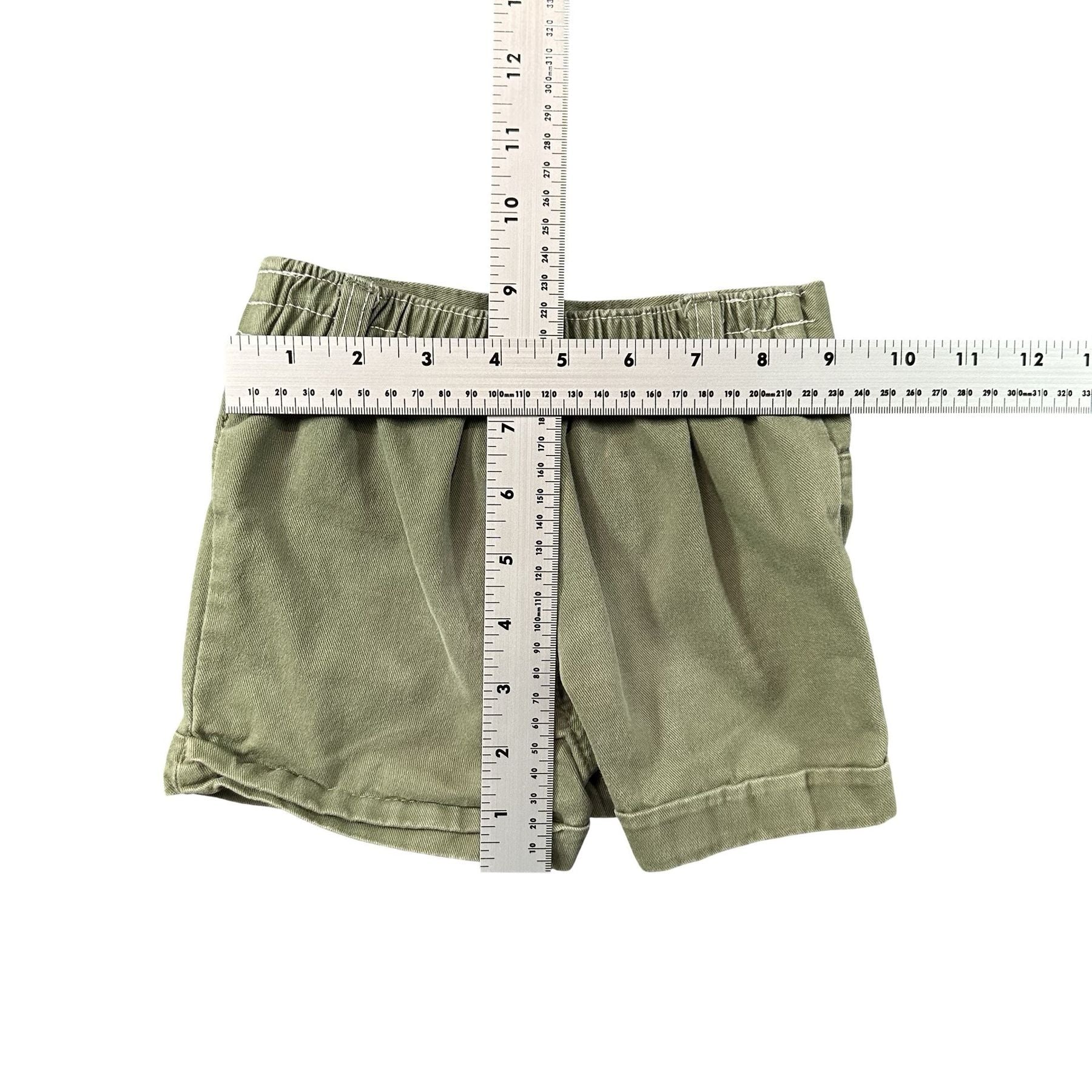 Olive Green Floral Embroidered Denim Shorts Toddler 2T - flat lay measurements with tape measure