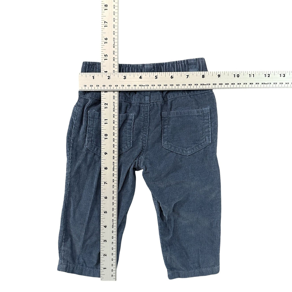 Carter's Blue Corduroy Baby Pants 9M - flat lay measurements with tape measure