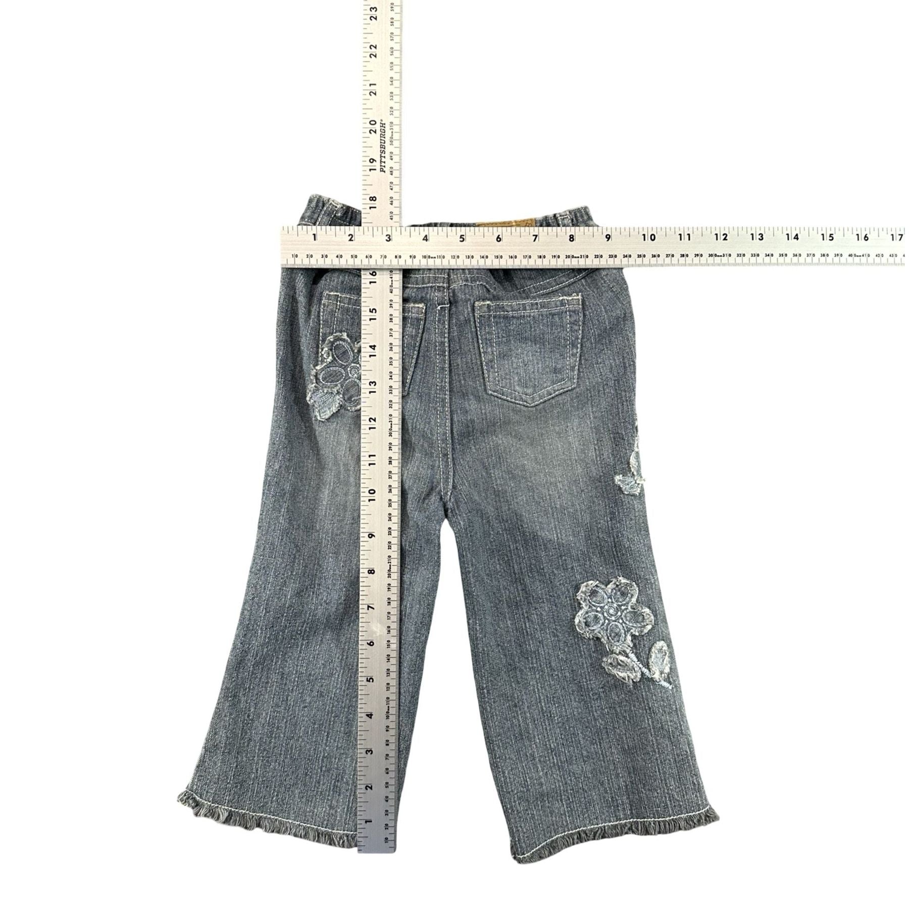 Children's Place Grey Floral Flare Jeans 18M - flat lay measurements with tape measure