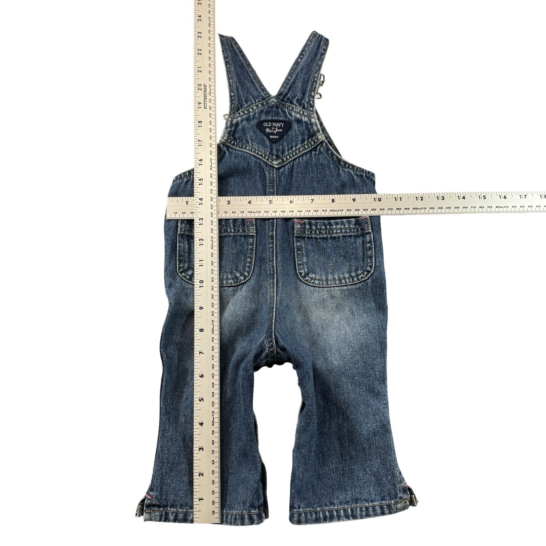 Old Navy Baby Denim Overalls 6-12M - flat lay measurements with tape measure