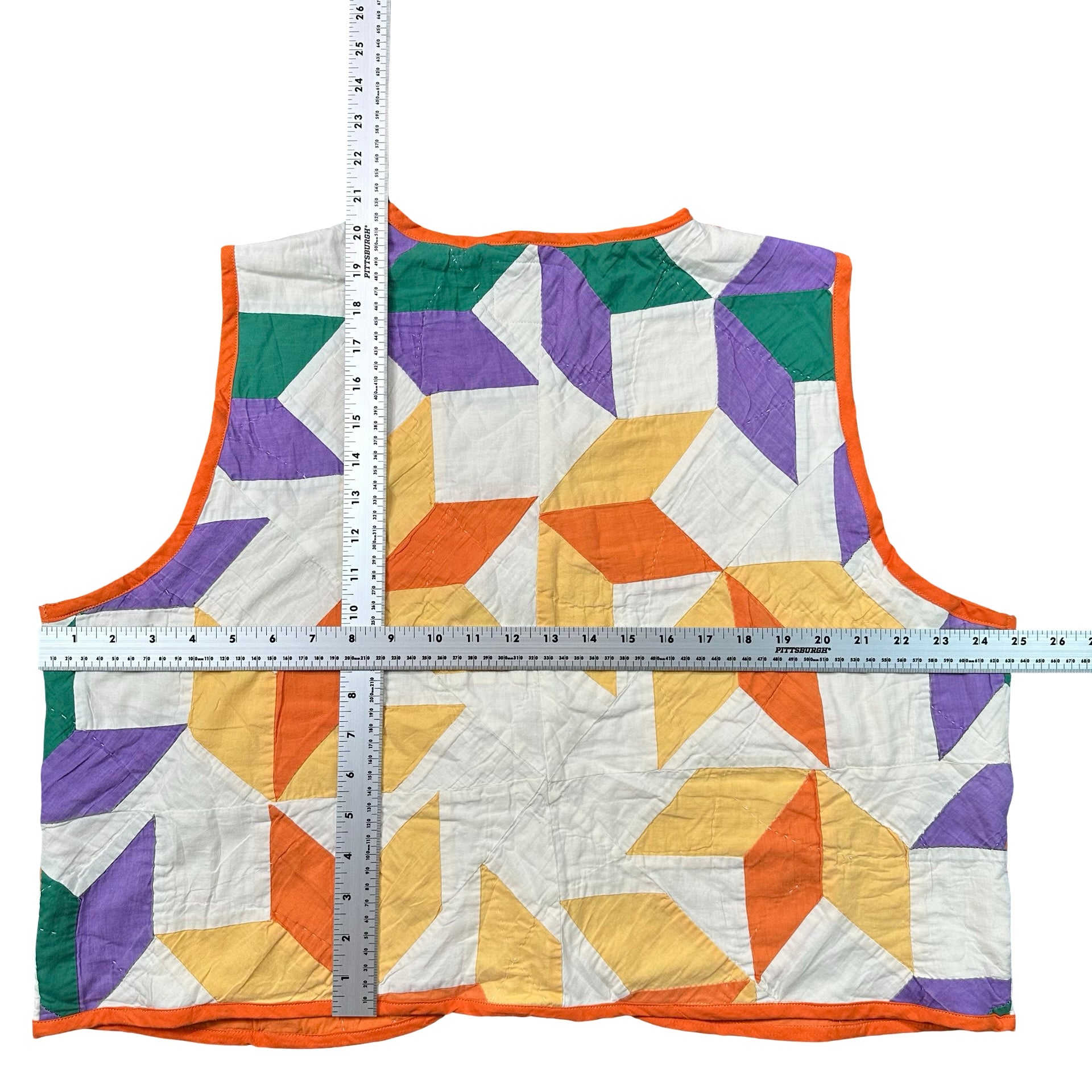 Marigold Card Trick quilted vest rework, flat lay measurements with tape measure