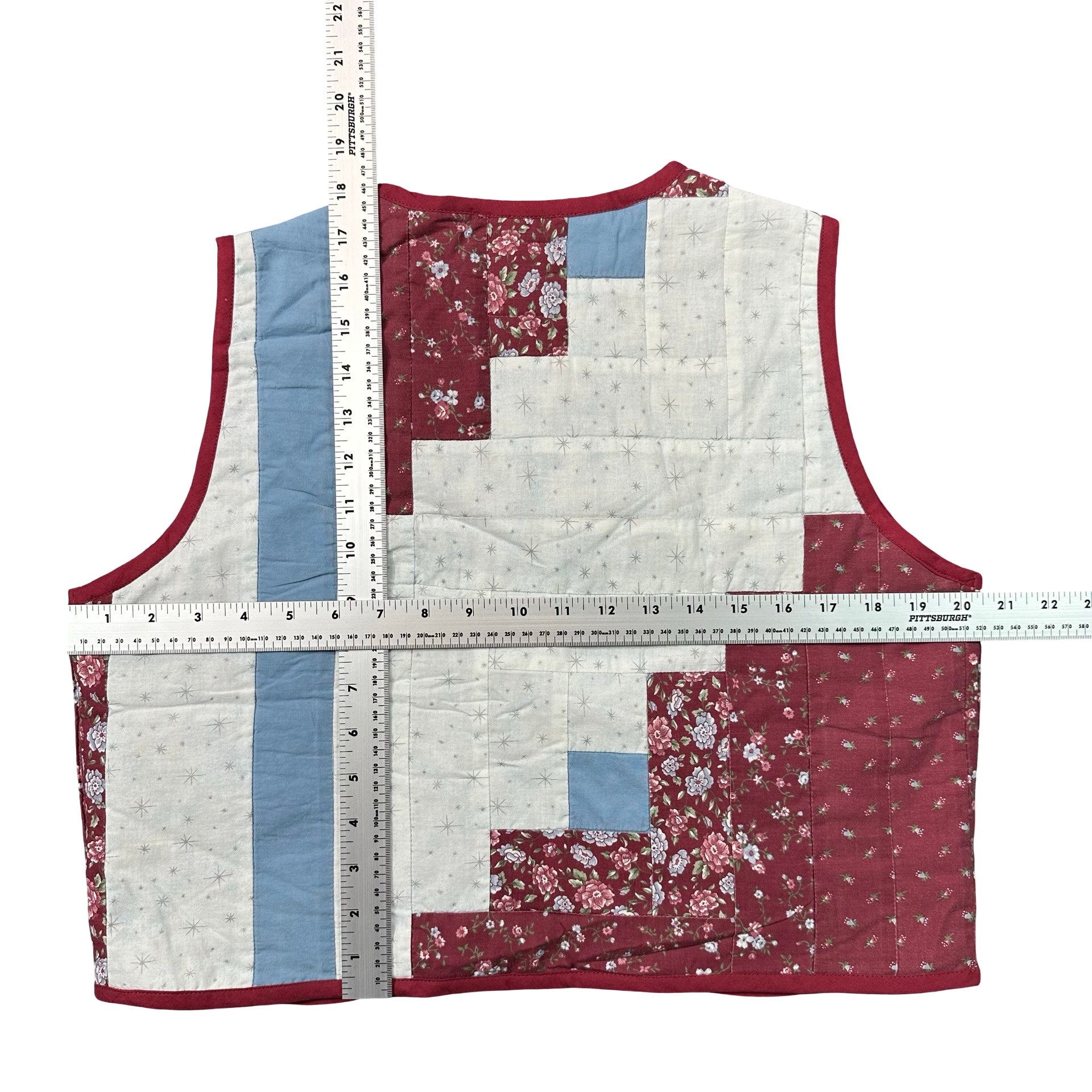 Burgundy Rose Log Cabin S quilted vest rework - tape measure