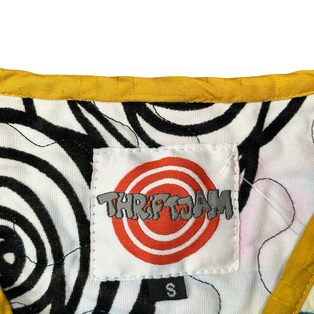 Midnight Batik Scrap S quilted vest rework - ThriftJam size tag