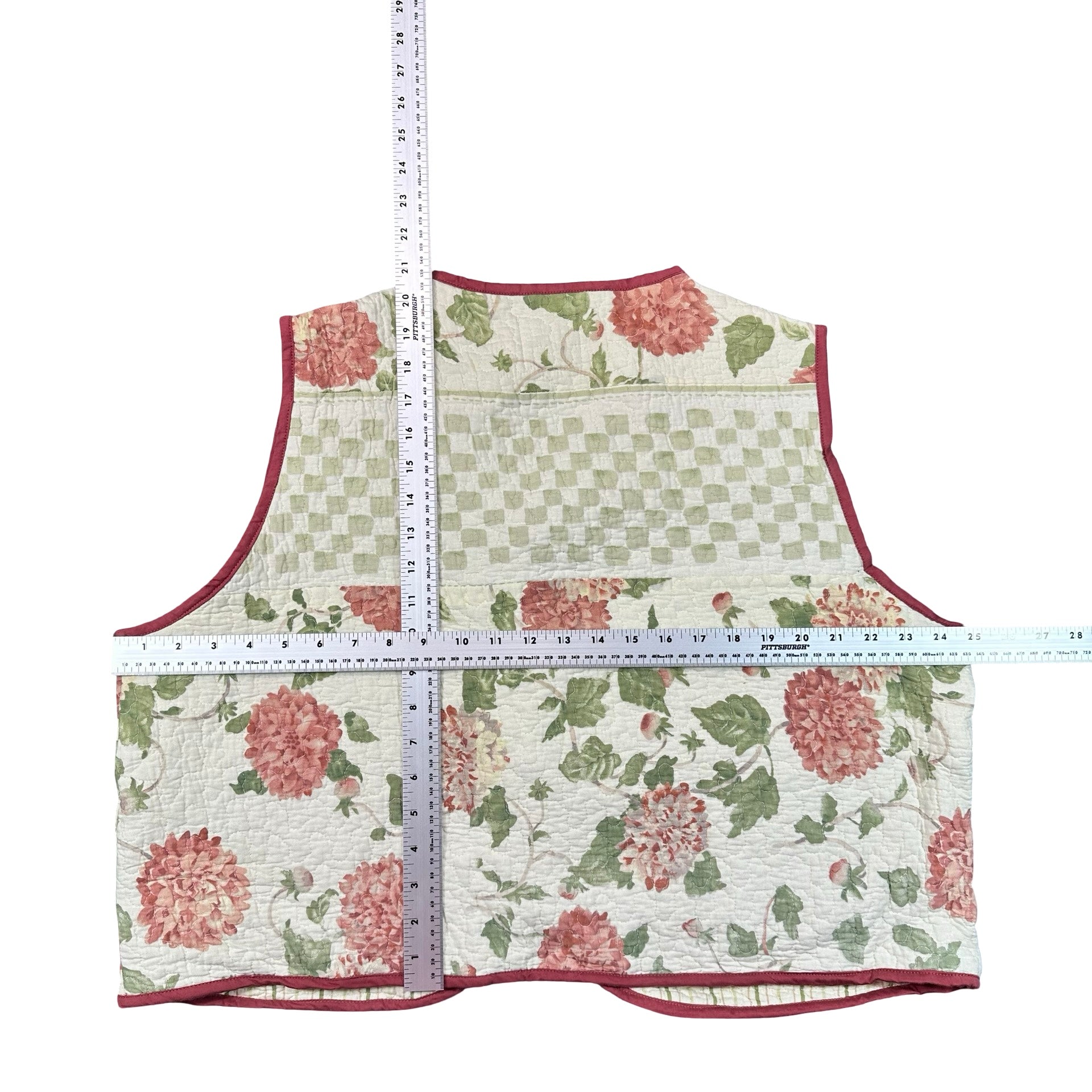 Coral Chrysanthemum 2XL quilted vest rework, flat lay measurements with tape measure