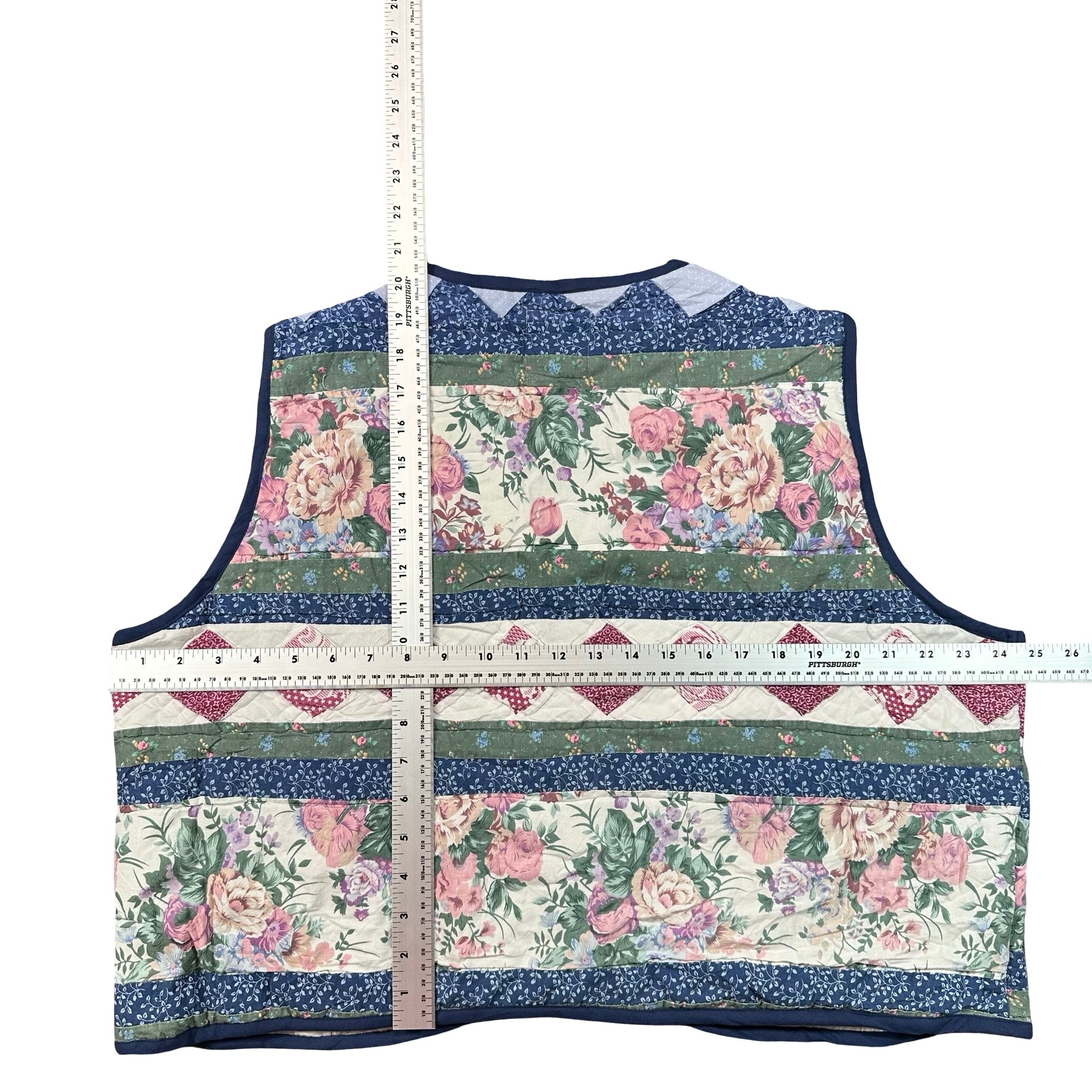 Navy Cottage Floral 2XL quilted vest rework, flat lay measurements with tape measure