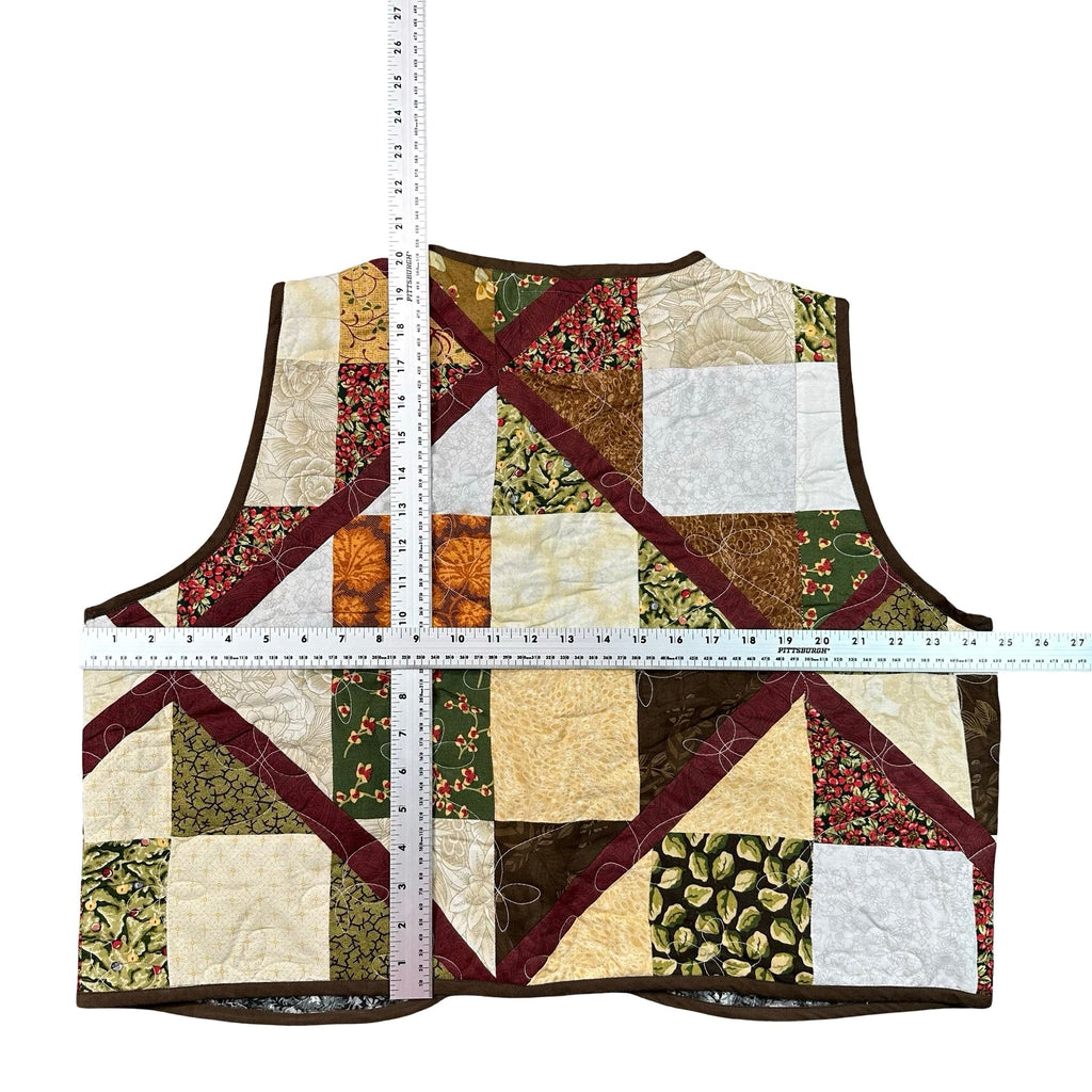 Woodland Patchwork 2XL quilted vest rework, flat lay measurements with tape measure