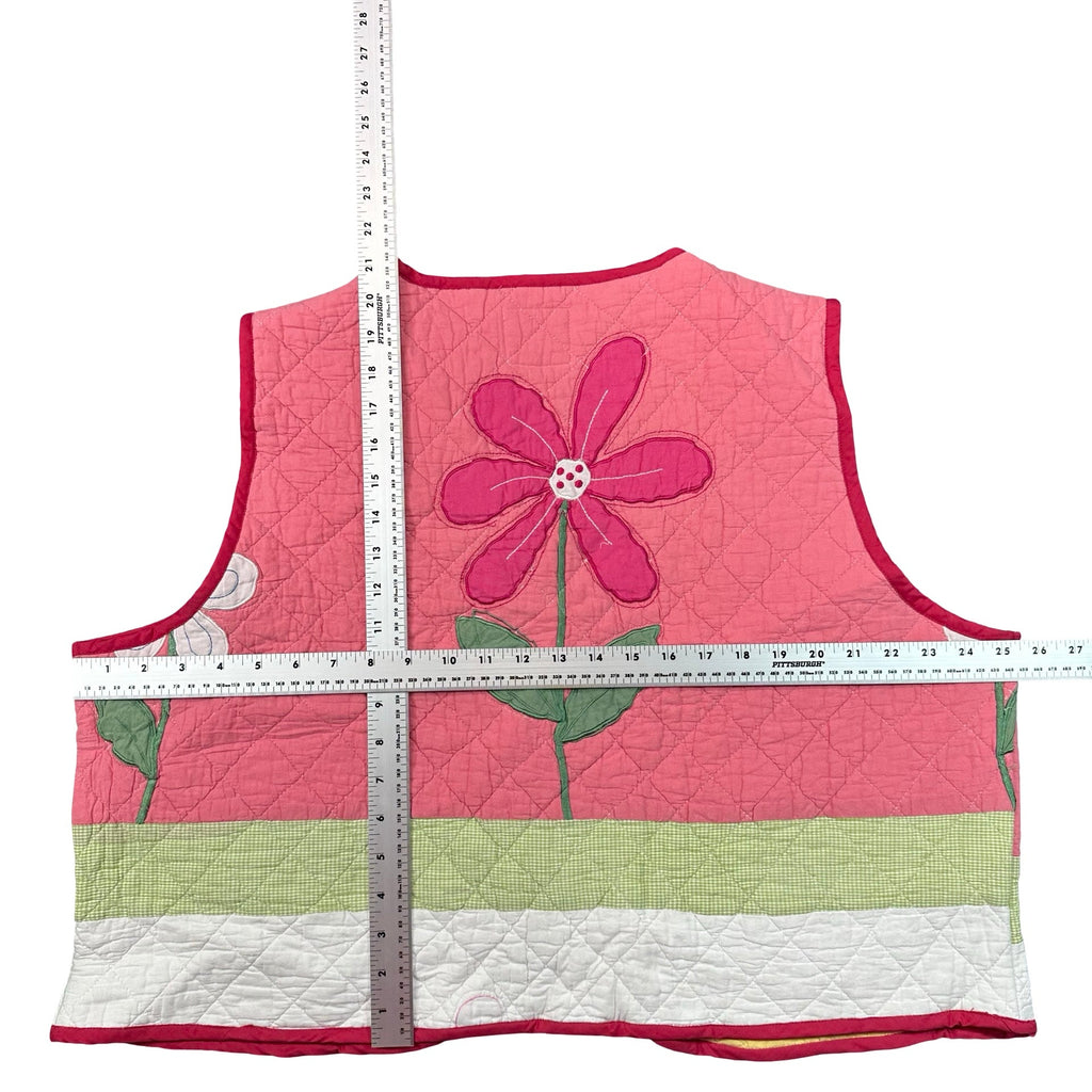 Pink Daisy Applique quilted vest rework, flat lay measurements with tape measure
