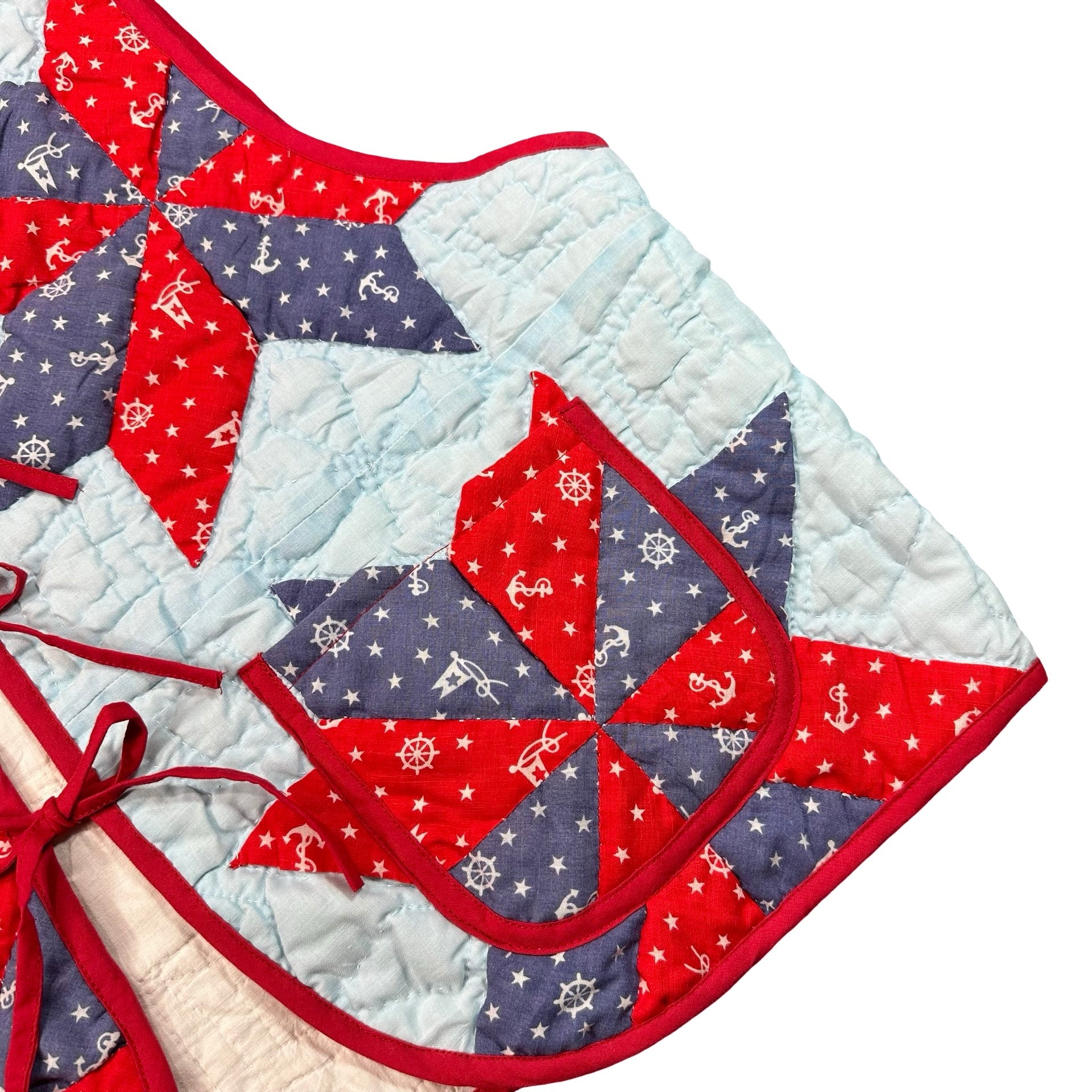 Nautical Star quilted vest rework, front pocket and anchor print detail