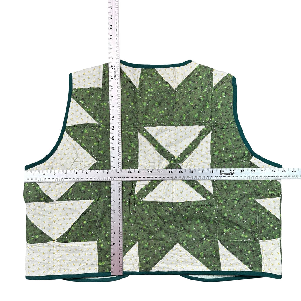 Green Bear Paw 2XL quilted vest rework, flat lay measurements with tape measure