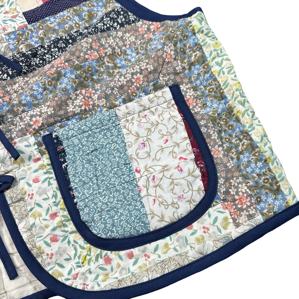 Blue Calico Log Cabin XL quilted vest rework, patch pocket detail