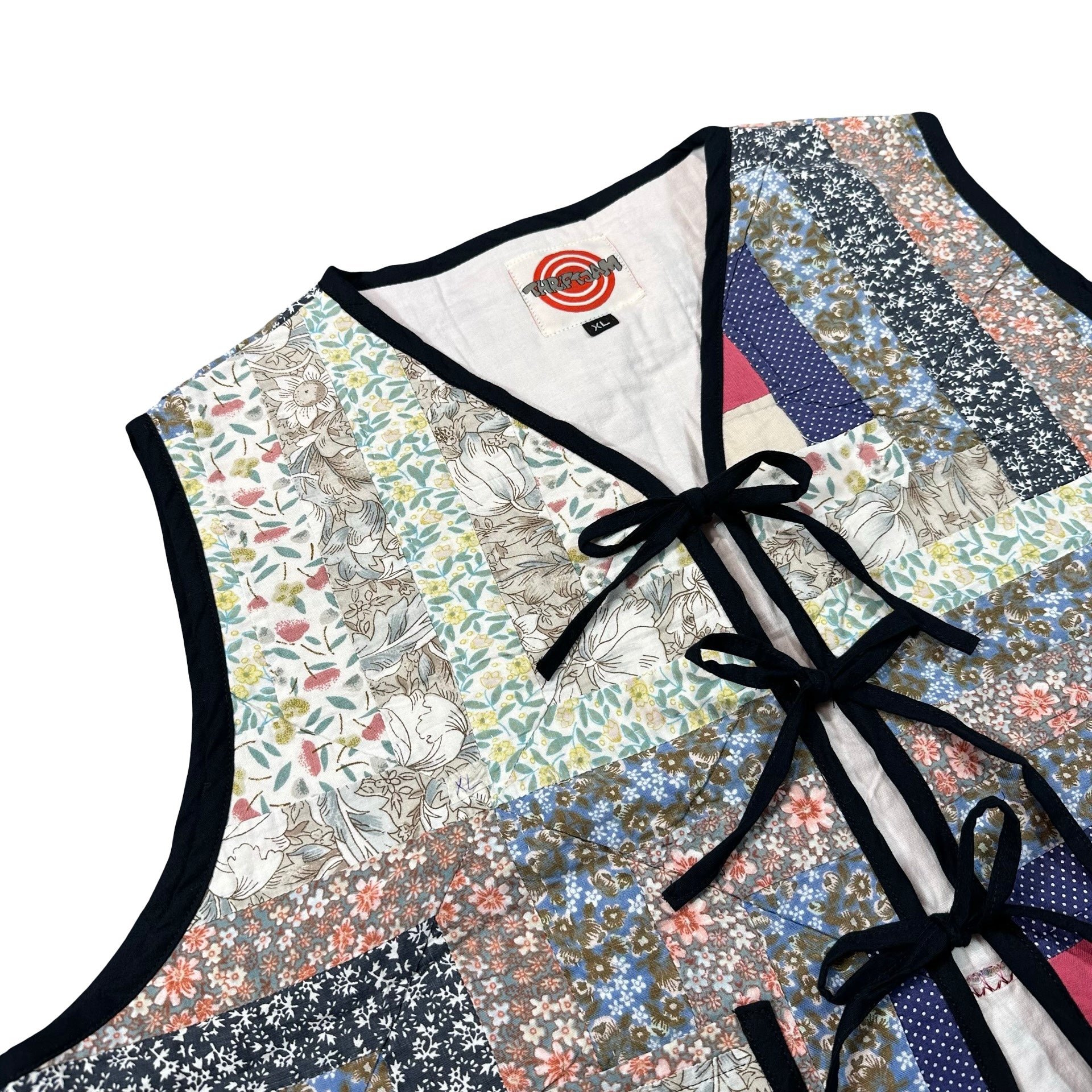 Wildflower Log Cabin XL quilted vest rework, front tie closures