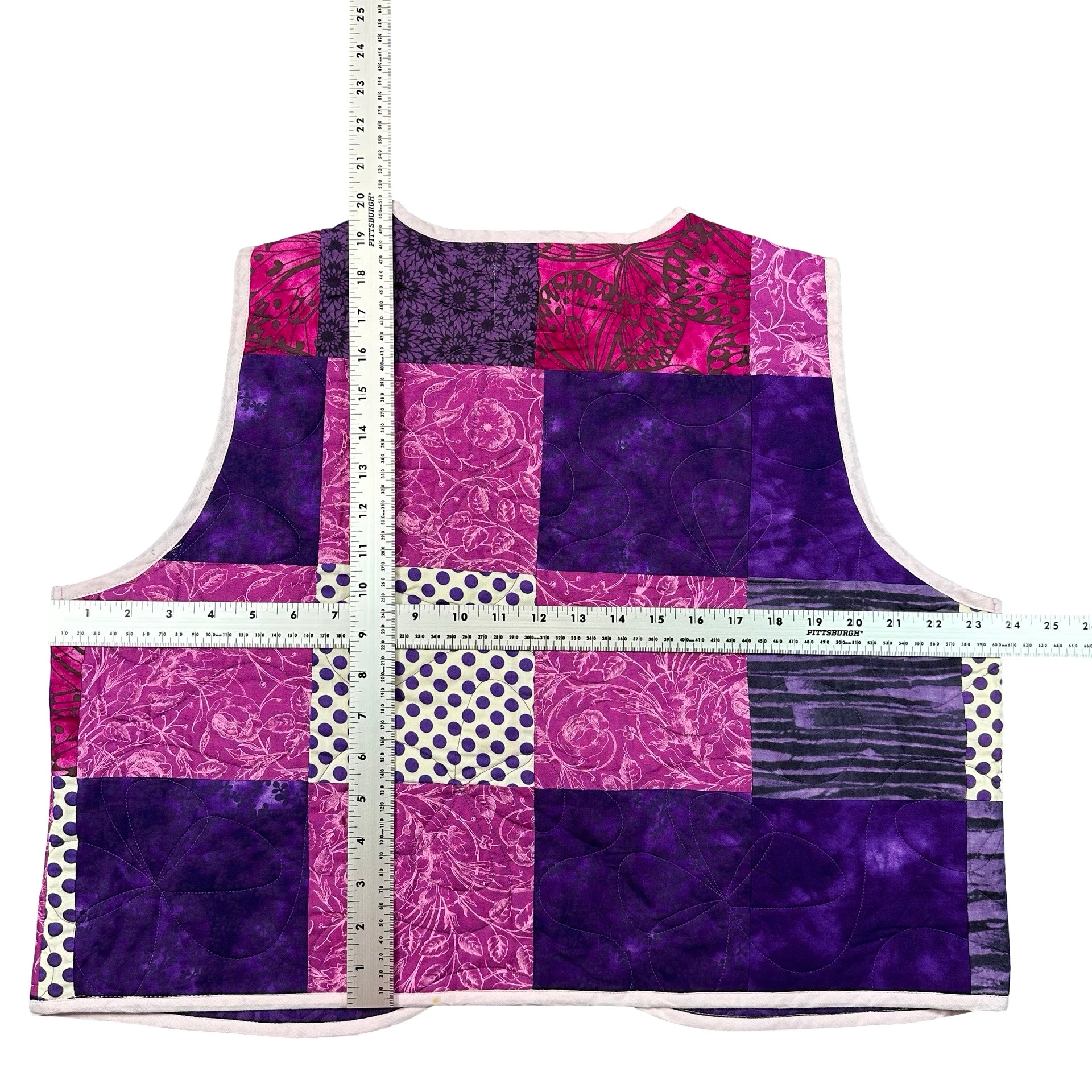 Purple Batik Patchwork XL quilted vest rework, tape measure across the chest