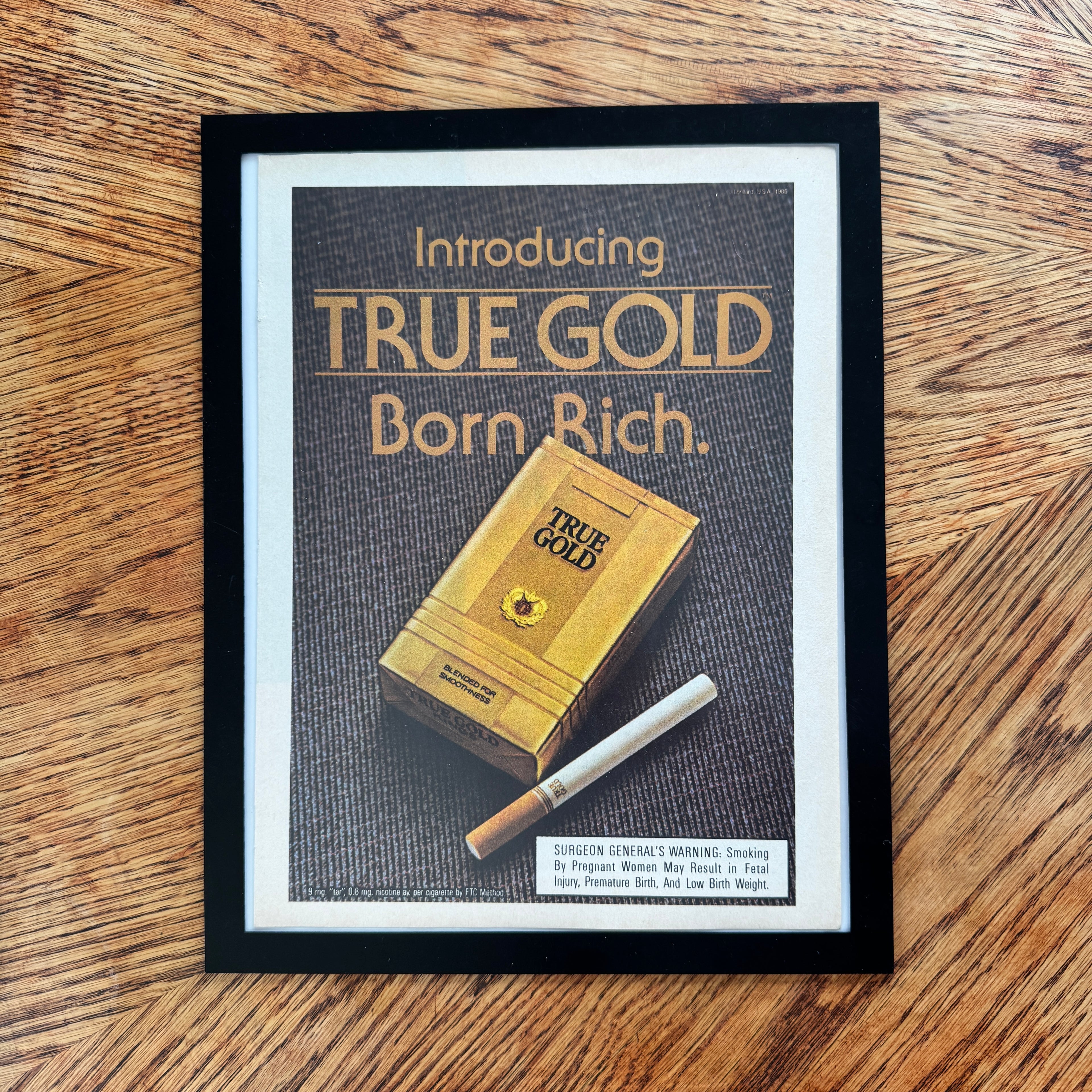 True Gold Cigarettes Born Rich Vintage 1985 Cigarette Ad Print - detail view