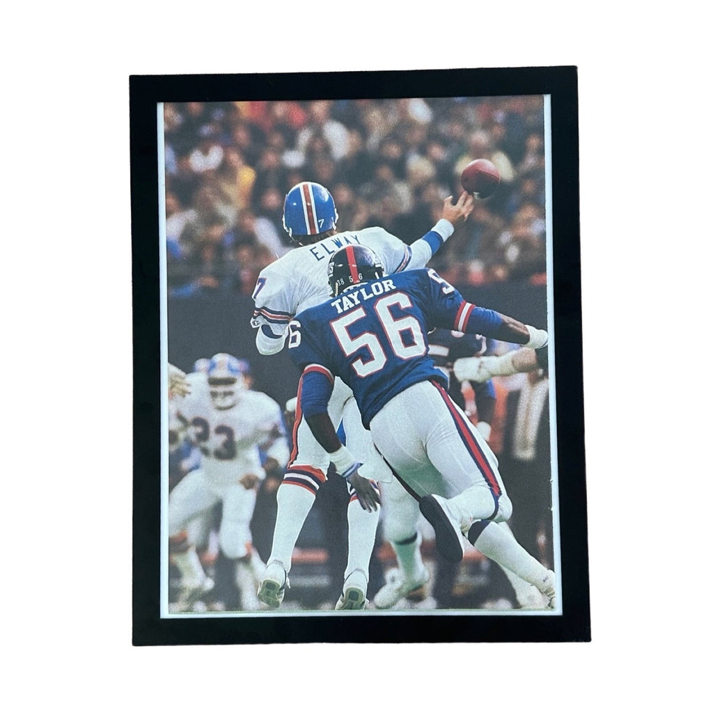 1987 Vintage Elway vs Lawrence Taylor NFL Action Framed Editorial Photo Print