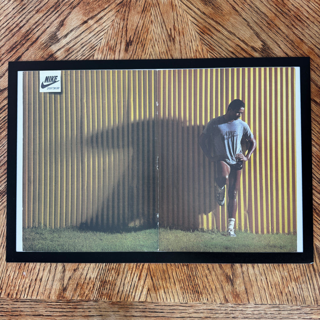 Framed vintage Nike Sportswear runner double page magazine ad