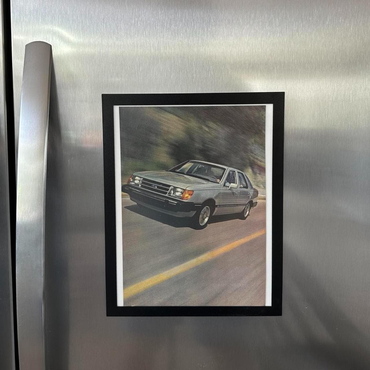 Vintage 1983 Ford Tempo Ad with Frame