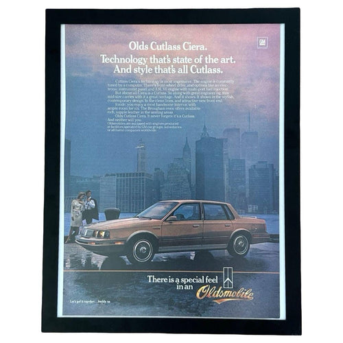 1980's Oldsmobile Cutlass Ciera NYC Skyline Vintage Car Magazine Ad with Frame